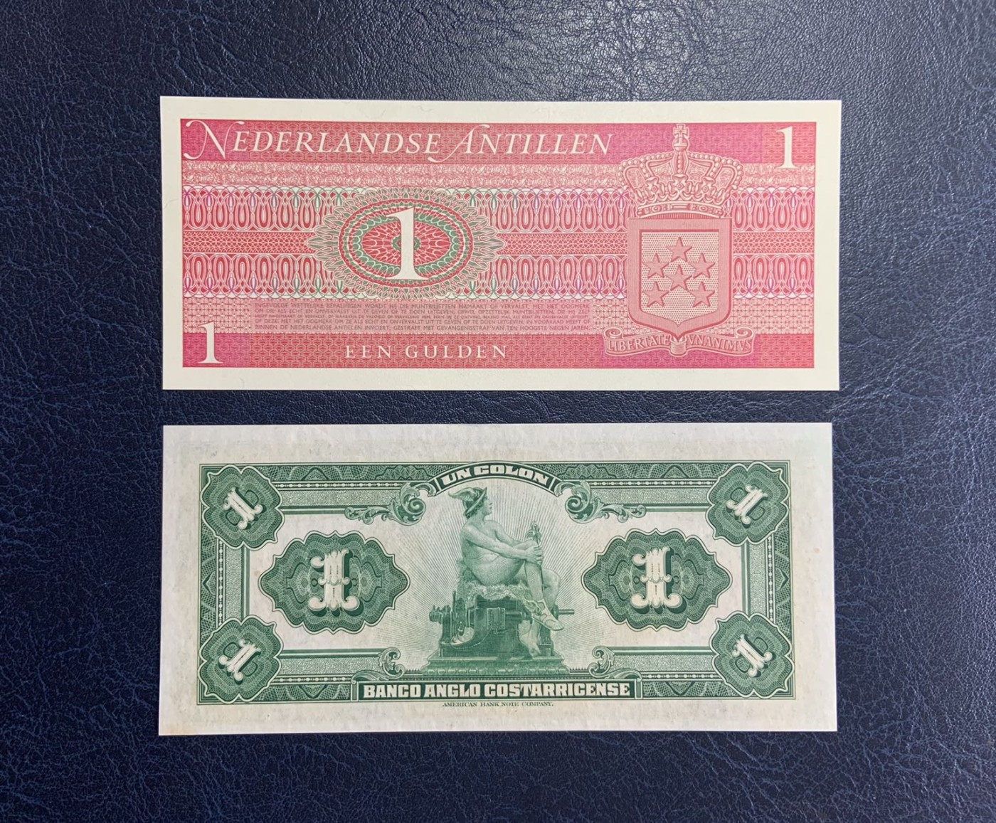 收藏联盟Quantum Auction 第278期拍卖  荷属安德烈斯1970年1盾和哥斯达黎加1917年1克朗 品相分别为全新UNC 和UNC 哥斯1克朗一角有黄