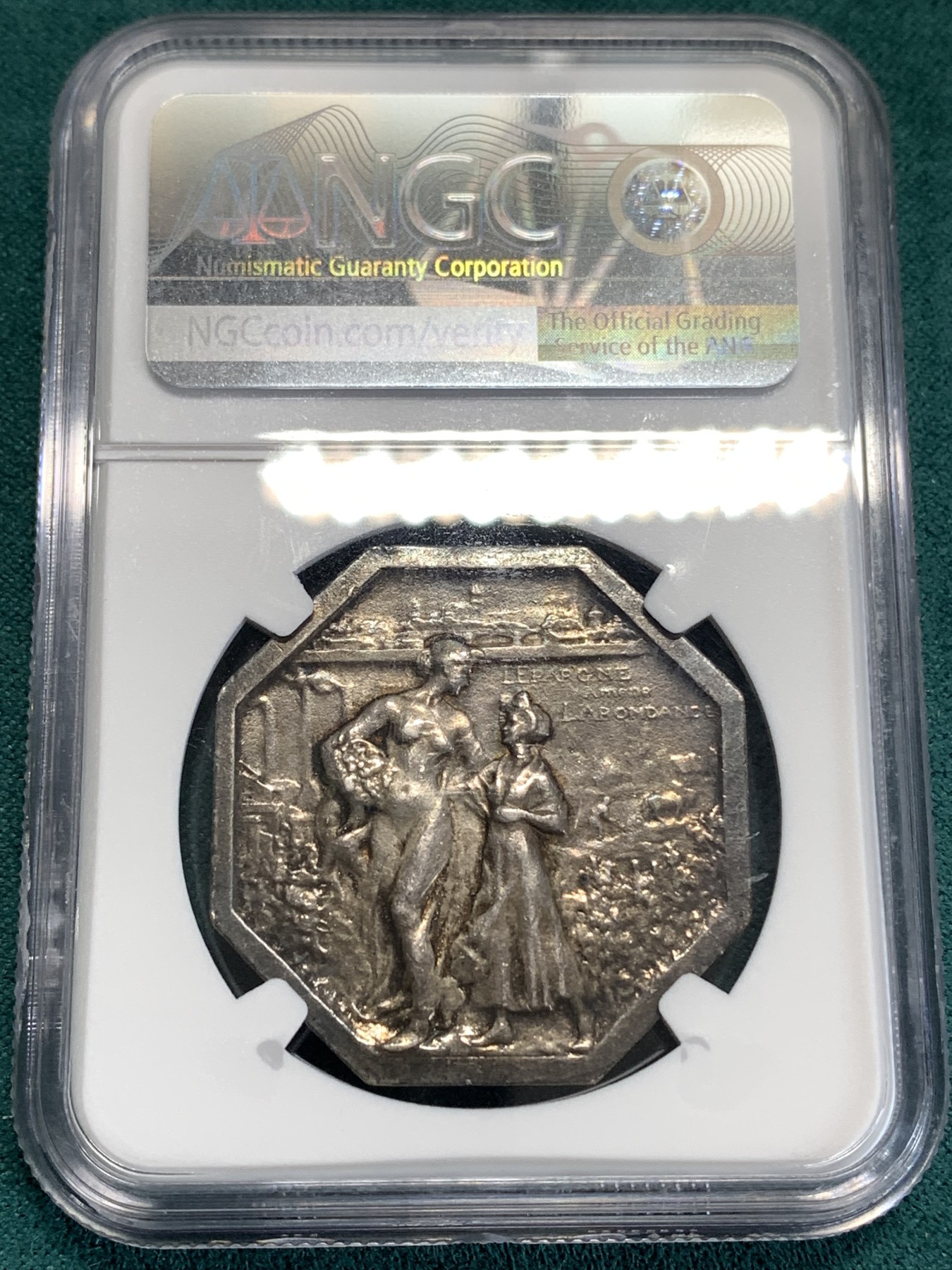 《竞宝斋》第186场-周日，周一 2场 (全场包邮) NGC-AU53 法国 昂热储蓄银行 花神八角代币 稀见品种，包浆细节俱佳，明显低评。女神刻画细腻，精美传神。边铭刻有数字18，发行量极少