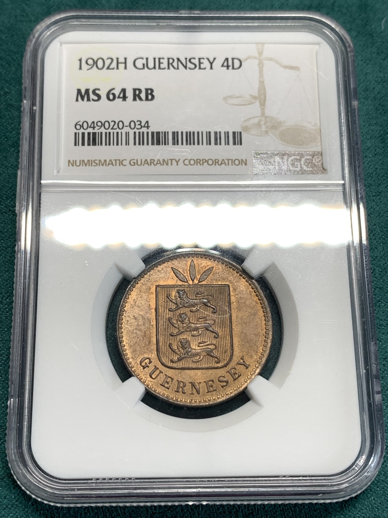 《竞宝斋》第186场-周日，周一 2场 (全场包邮) NGC-MS64RB 亚军分 1902年英属根西岛4道布铜币，三狮正面像，面部细节出色，铜光犹存，状态出