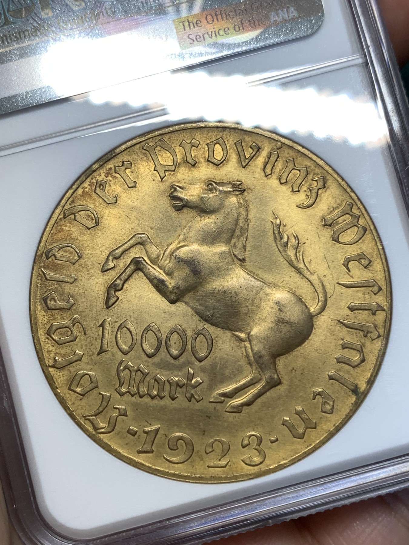 《竞宝斋》第186场-周日，周一 2场 (全场包邮) NGC-MS65 德国威斯特伐利亚1923年10000马克镀金大马币