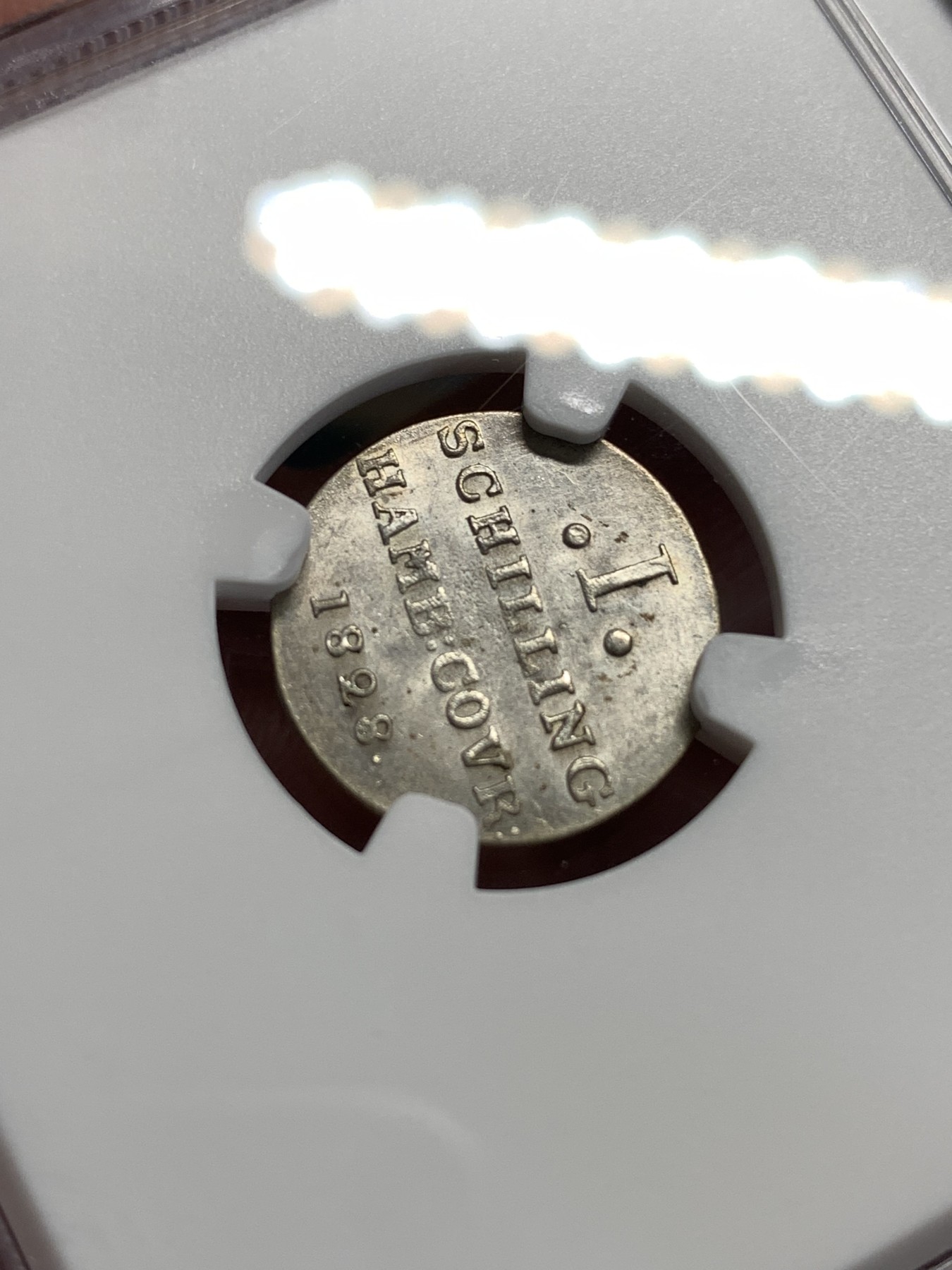 《竞宝斋》第186场-周日，周一 2场 (全场包邮) NGC-MS61 德国汉堡1828年1先令、打制锐利的小城堡，打制币辅币，转光强