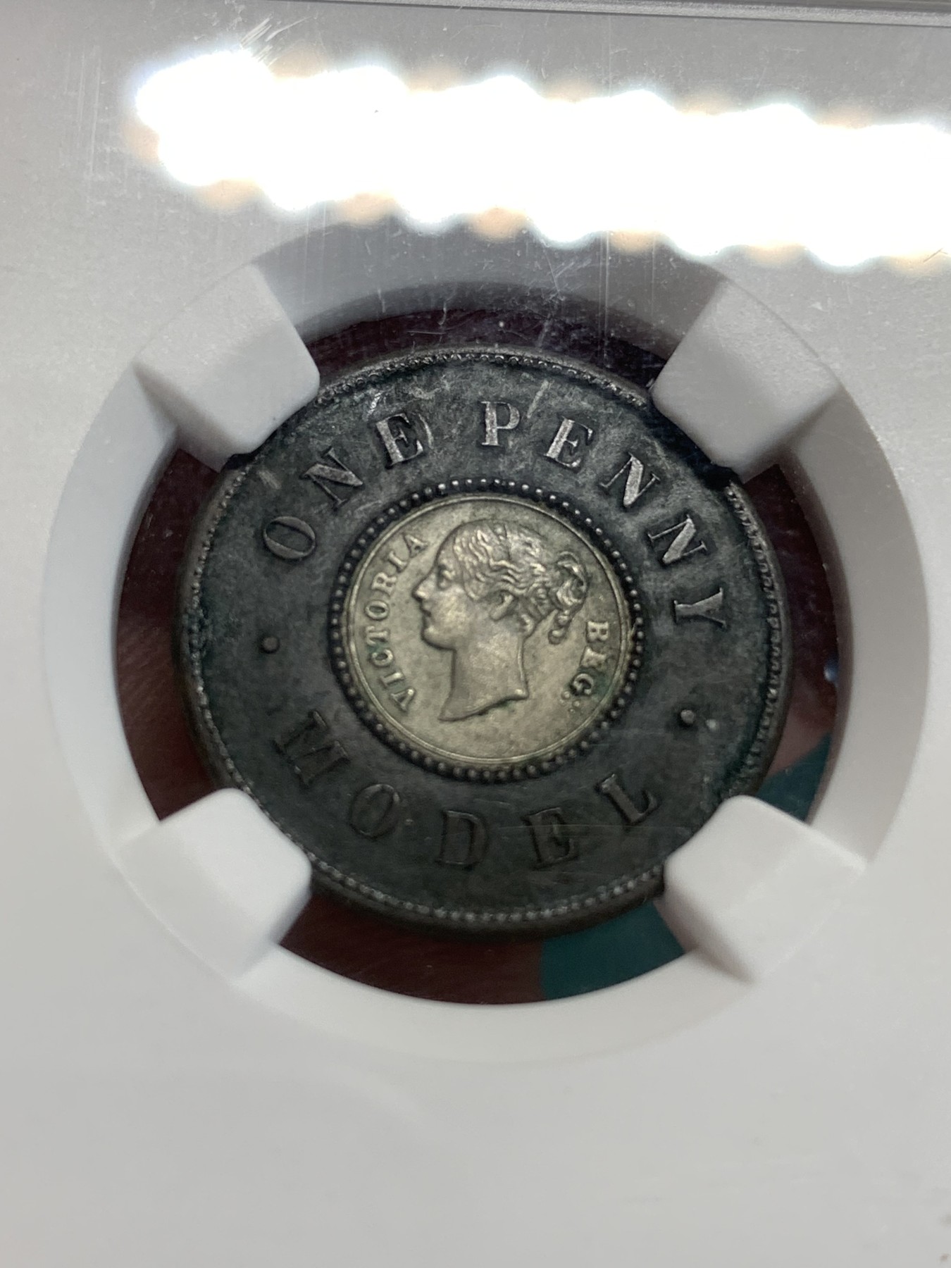 《竞宝斋》第186场-周日，周一 2场 (全场包邮) NGC UNC 英国1844年双色1便士 原味包浆 细节不错