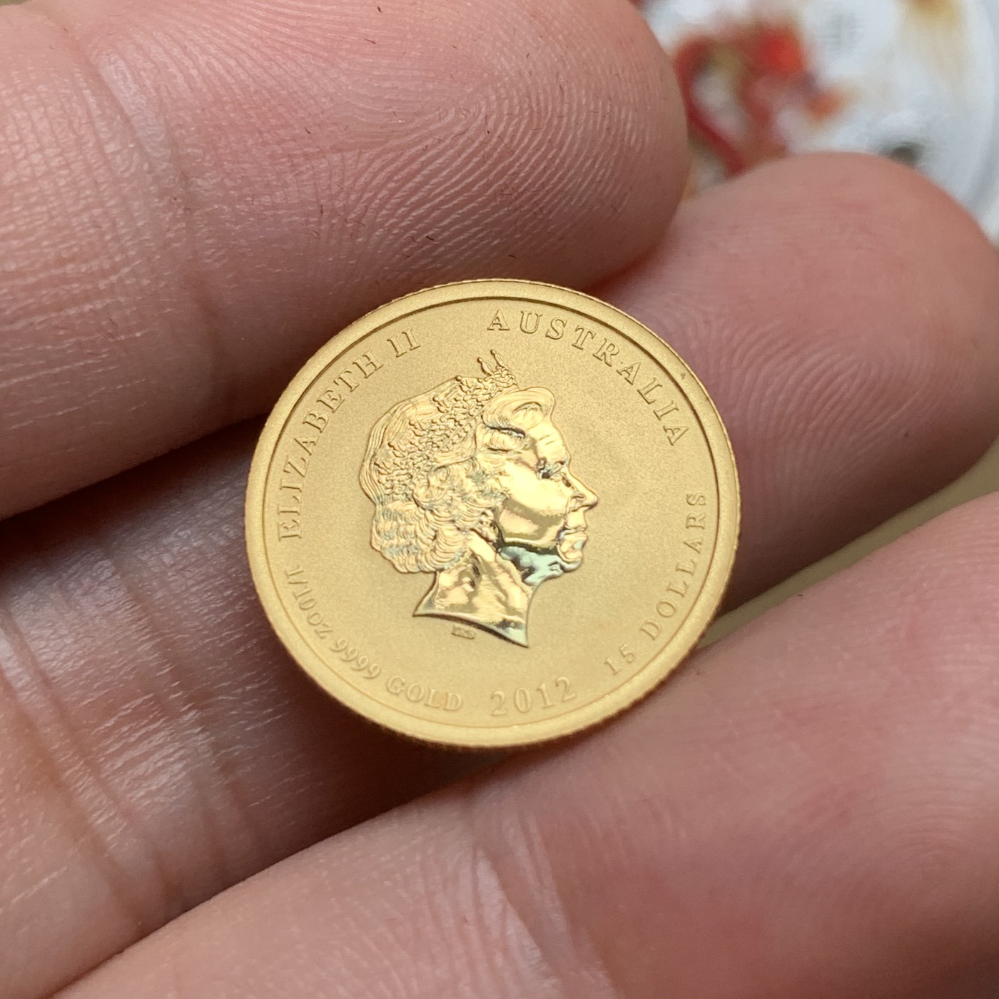 《竞宝斋》第186场-周日，周一 2场 (全场包邮) 澳大利亚2012年龙年生肖纪念彩色金银币套装，原盒带证书。1/10盎司金币3.1克9999金和1盎司银币，珀斯铸币局造