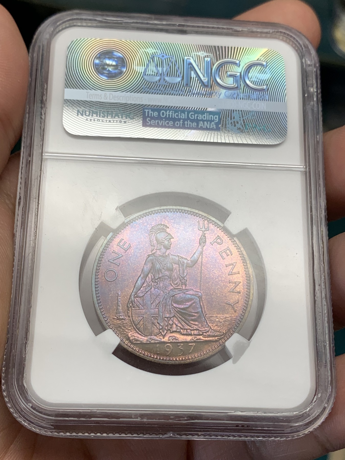《竞宝斋》第186场-周日，周一 2场 (全场包邮) NGC PF66RB 英国1937年乔治六世精制1便士铜币一枚，顶级自然氧化五彩包浆，美轮美奂，竞宝斋拍卖原物，成交价900