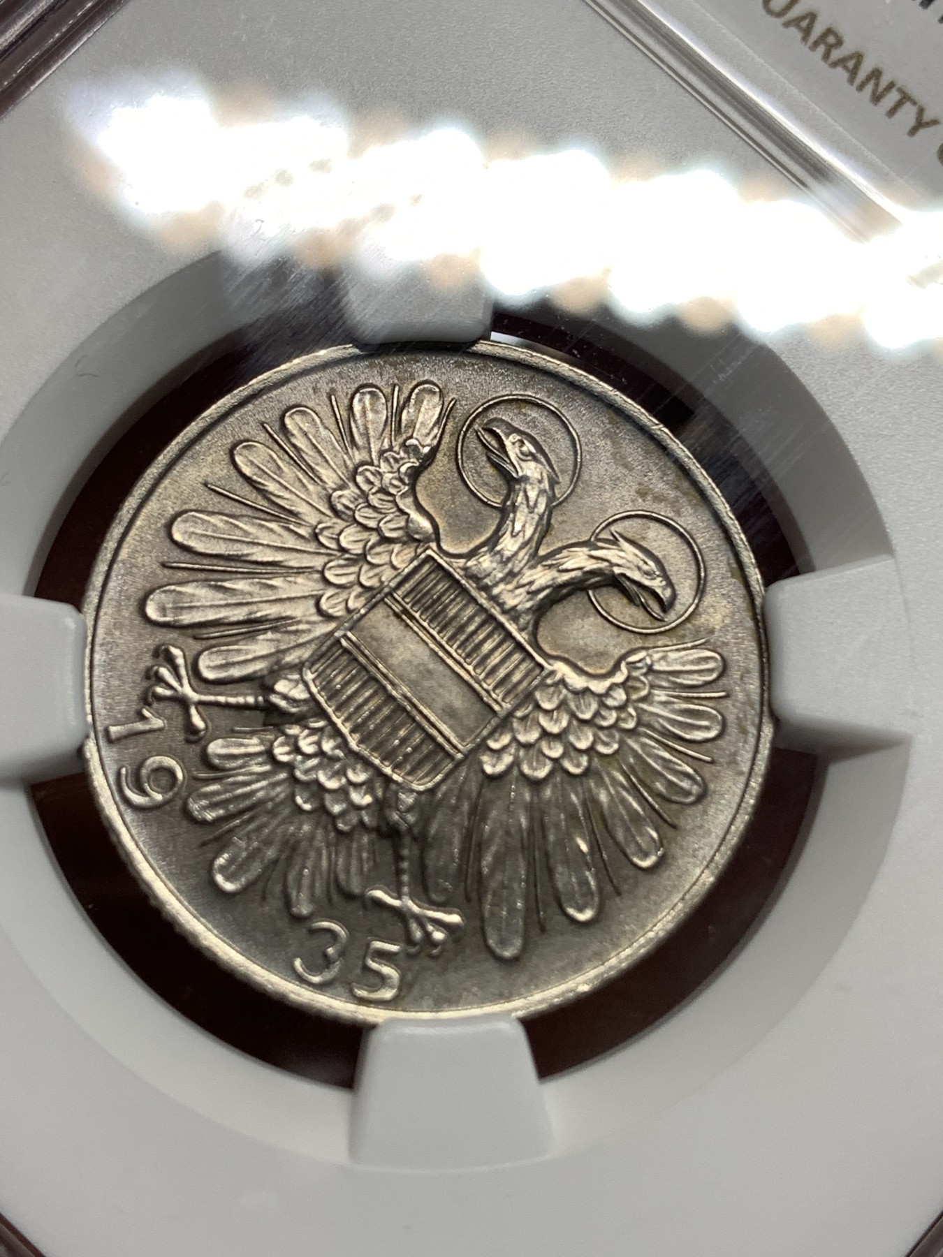 《竞宝斋》第186场-周日，周一 2场 (全场包邮) NGC-MS63 奥地利1935年 1先令银币，图案艺术性高，无可挑剔的品相