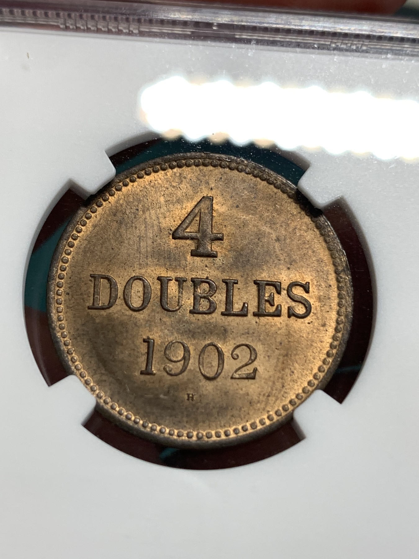 《竞宝斋》第186场-周日，周一 2场 (全场包邮) NGC-MS64RB 亚军分 1902年英属根西岛4道布铜币，三狮正面像，面部细节出色，铜光犹存，状态出