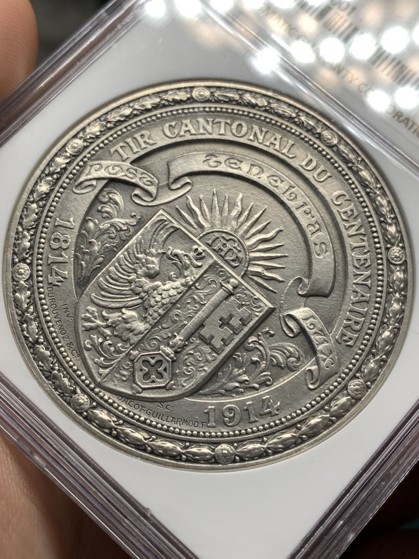 《竞宝斋》第186场-周日，周一 2场 (全场包邮) NGC-MS62 瑞士 1914年 日内瓦射击节 45mm 大银章 设计漂亮 细节满满