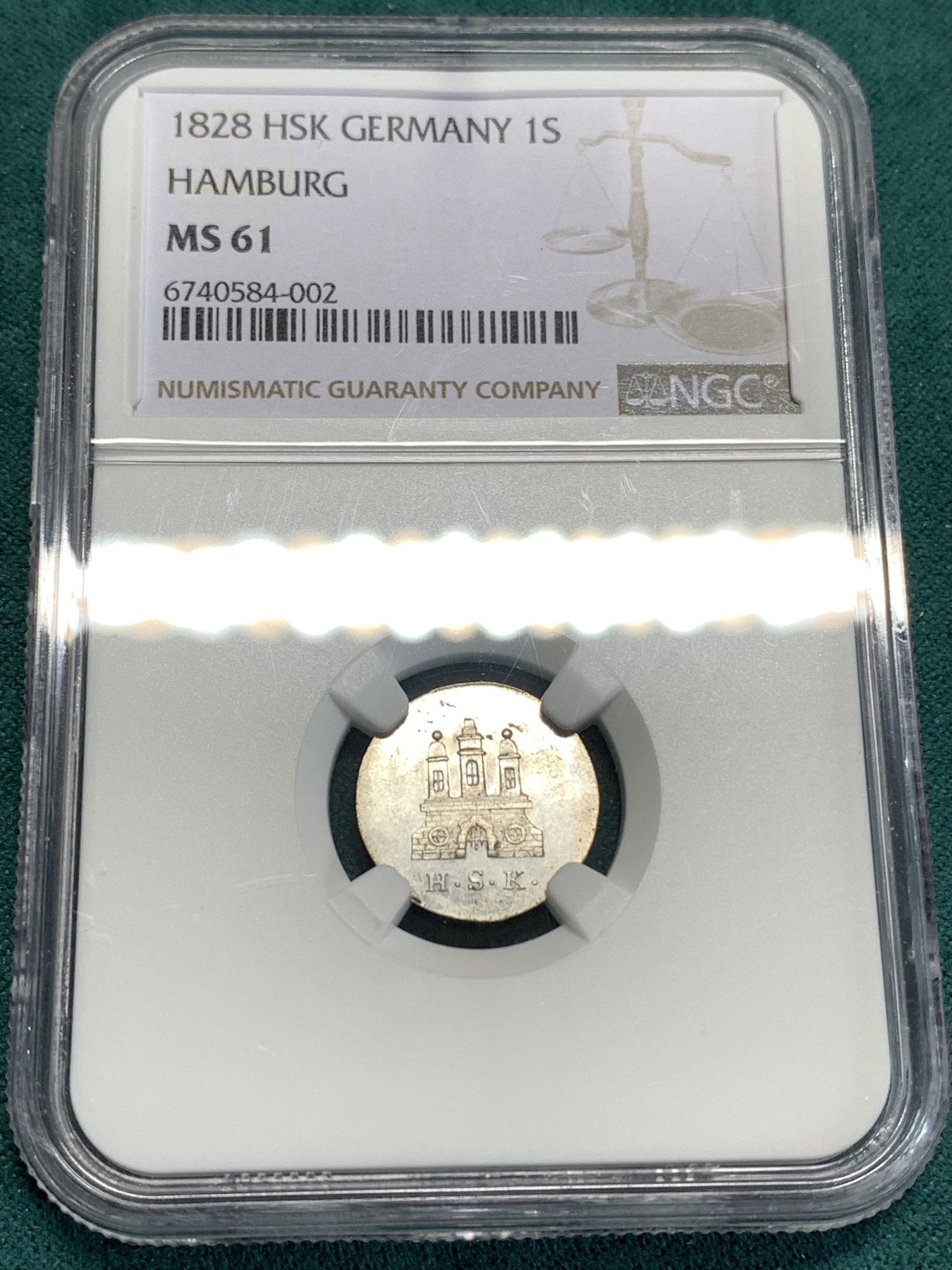 《竞宝斋》第186场-周日，周一 2场 (全场包邮) NGC-MS61 德国汉堡1828年1先令、打制锐利的小城堡，打制币辅币，转光强