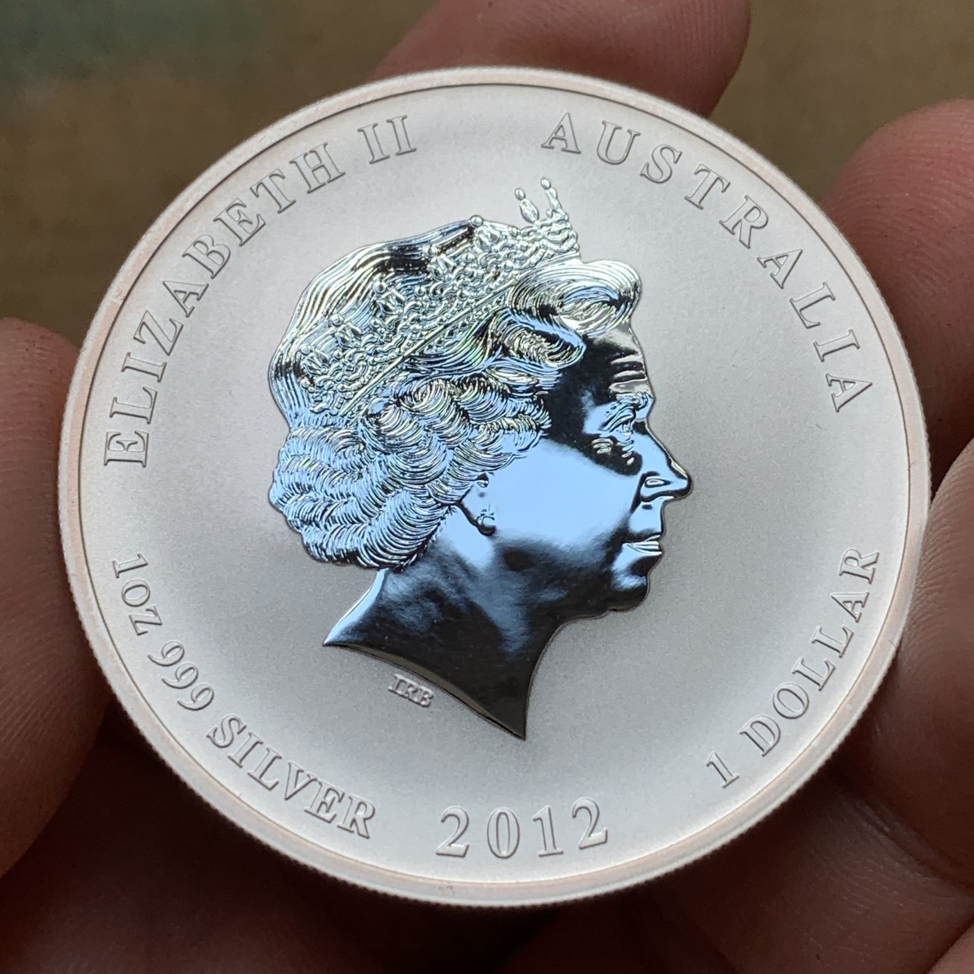 《竞宝斋》第186场-周日，周一 2场 (全场包邮) 澳大利亚2012年龙年生肖纪念彩色金银币套装，原盒带证书。1/10盎司金币3.1克9999金和1盎司银币，珀斯铸币局造