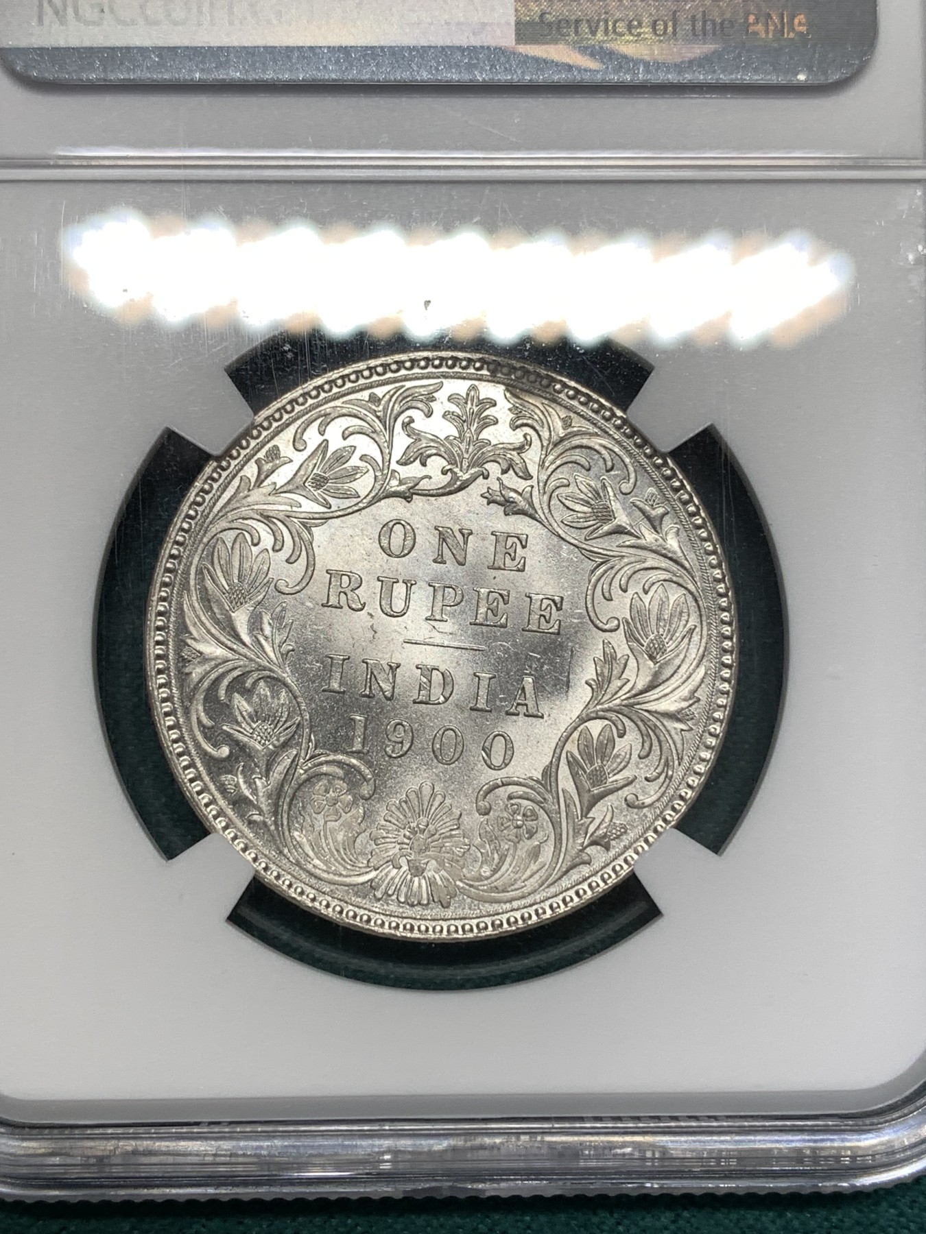 《竞宝斋》第186场-周日，周一 2场 (全场包邮) NGC MS62 1900年 维多利亚 印度 1卢比银币 卷拆原光 光度一流