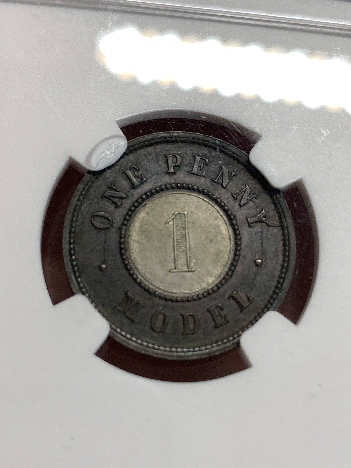 《竞宝斋》第186场-周日，周一 2场 (全场包邮) NGC UNC 英国1844年双色1便士 原味包浆 细节不错