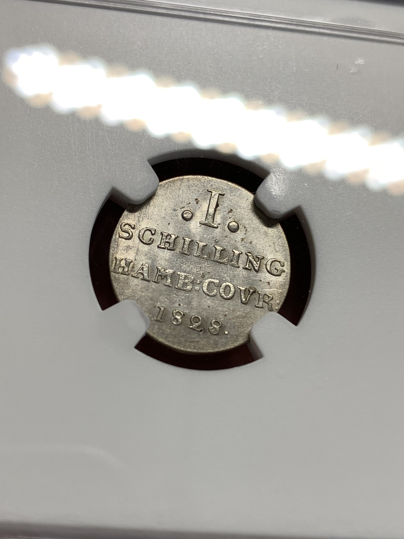 《竞宝斋》第186场-周日，周一 2场 (全场包邮) NGC-MS61 德国汉堡1828年1先令、打制锐利的小城堡，打制币辅币，转光强