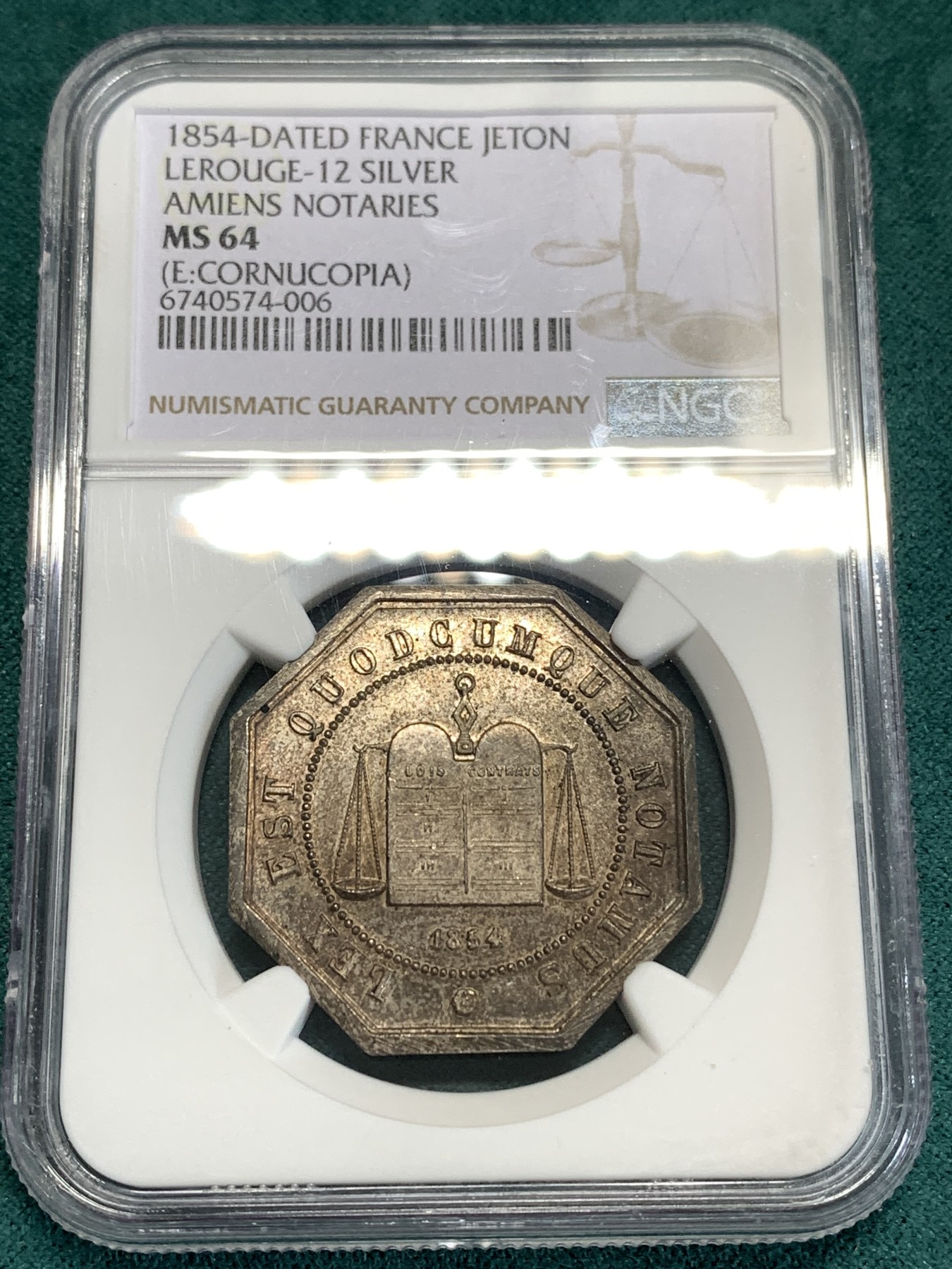 《竞宝斋》第186场-周日，周一 2场 (全场包邮) NGC-MS64 1854 法国亚眠公证处八角银章代用币镜面、顶级重彩加持下的64分、公证处带天秤图案