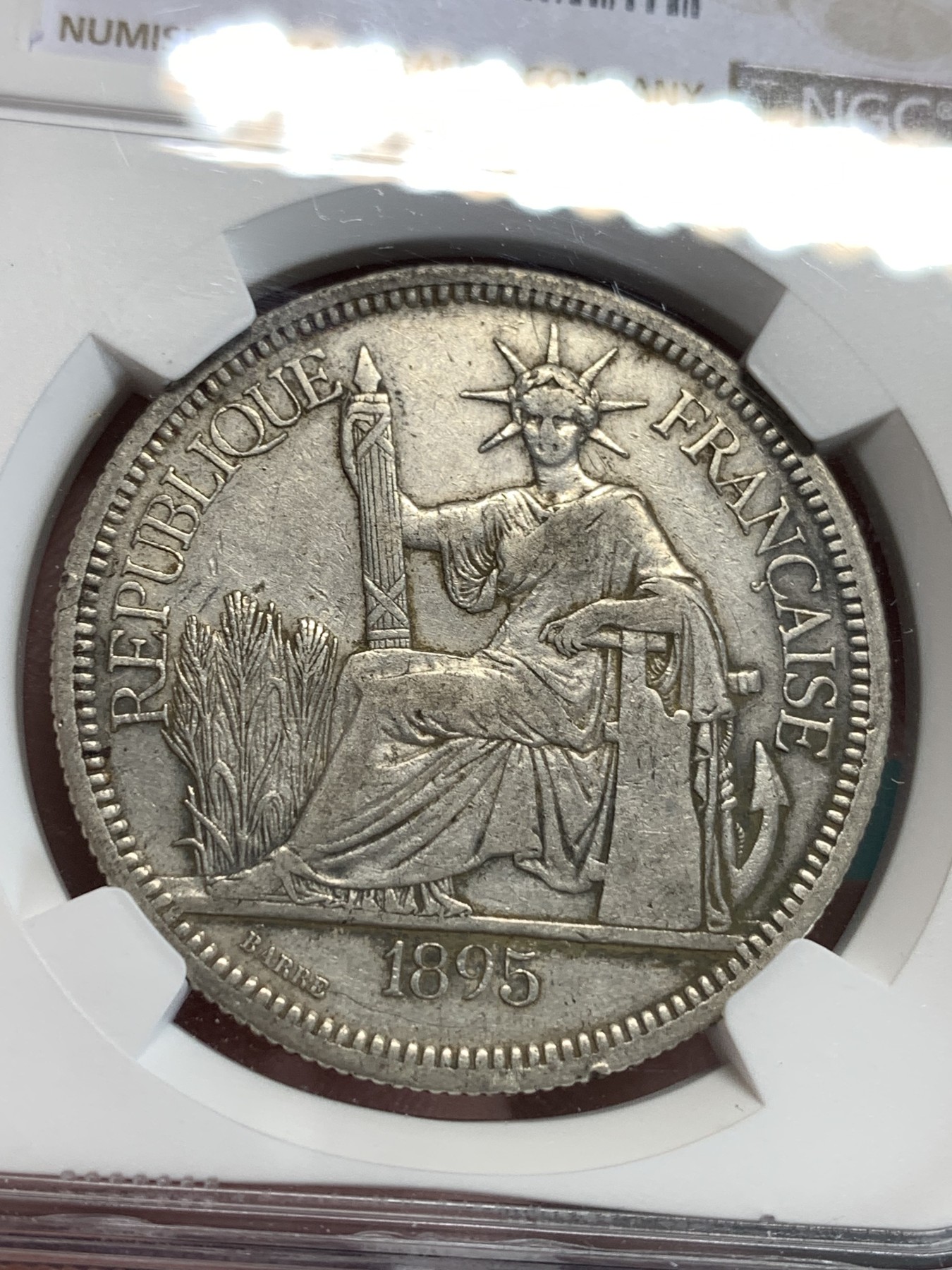 《竞宝斋》第186场-周日，周一 2场 (全场包邮) NGC-XF  法属印支 坐洋加重版 1895 1皮亚斯特 坐人银币