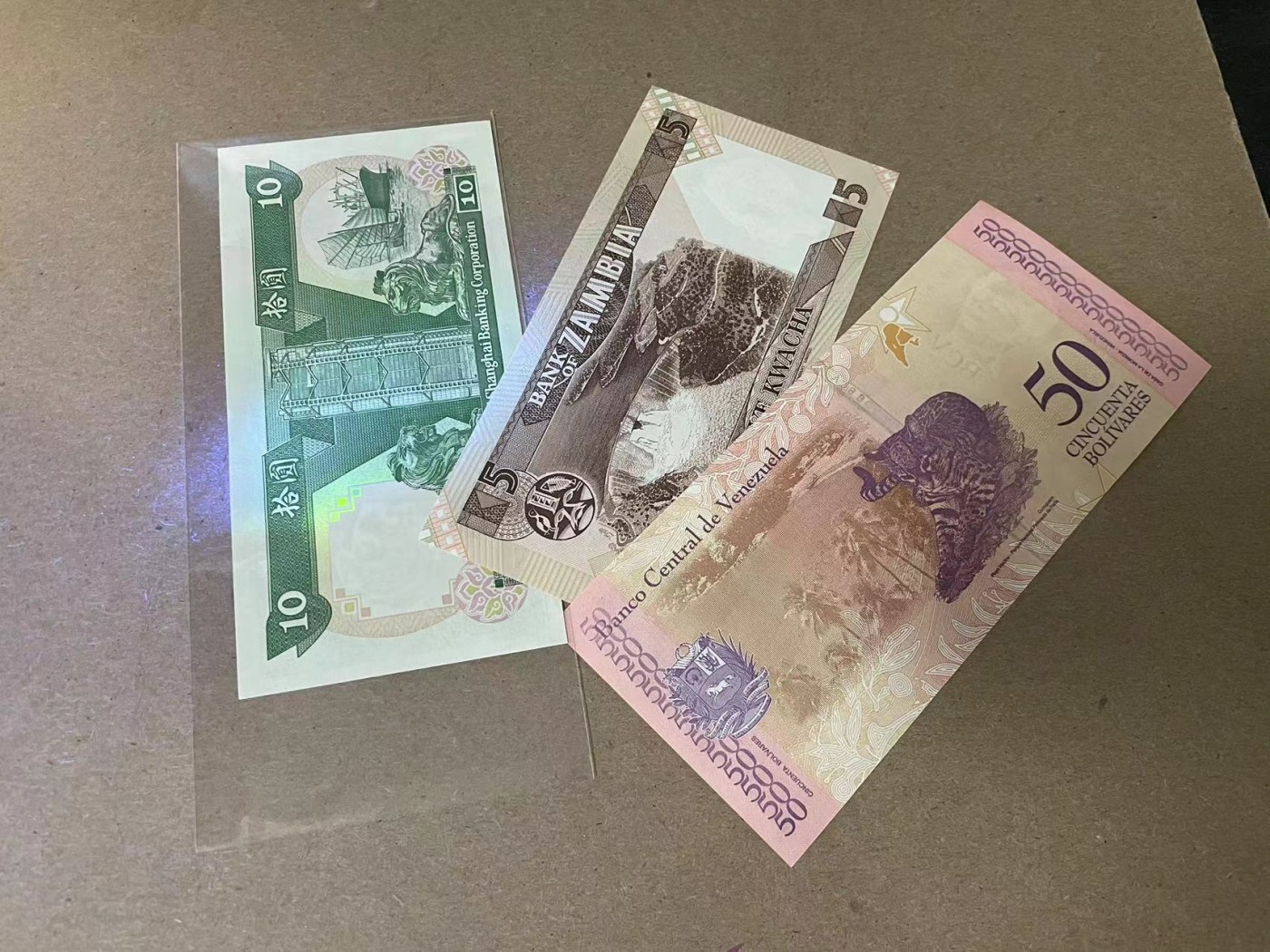 【Blue Auction】✨世界纸币精拍第354期——布克哈特【精】 【一组4张】百慕大 2009年2元  A1冠获奖钞  国评&香港 汇丰 1992年10元 555豹子号 UNC- &委内瑞拉、赞比亚纸币UNC