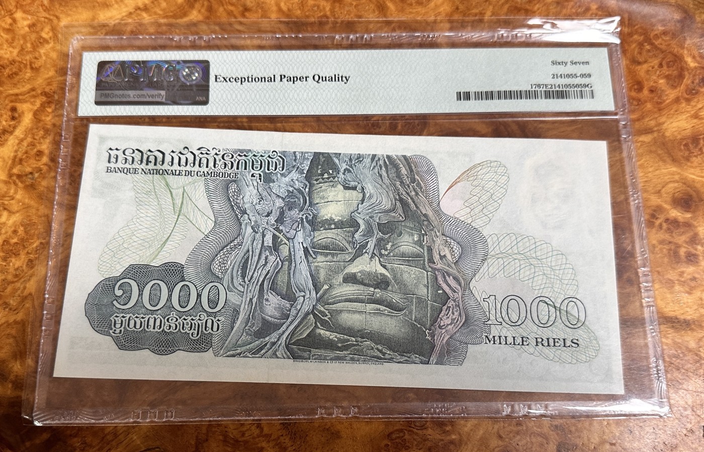Chase Auction 第23期 - - 外钞、民国钞和人民币混合场！ 1973年柬埔寨1000里亚尔，微笑的大佛，冠军分，PMG67！