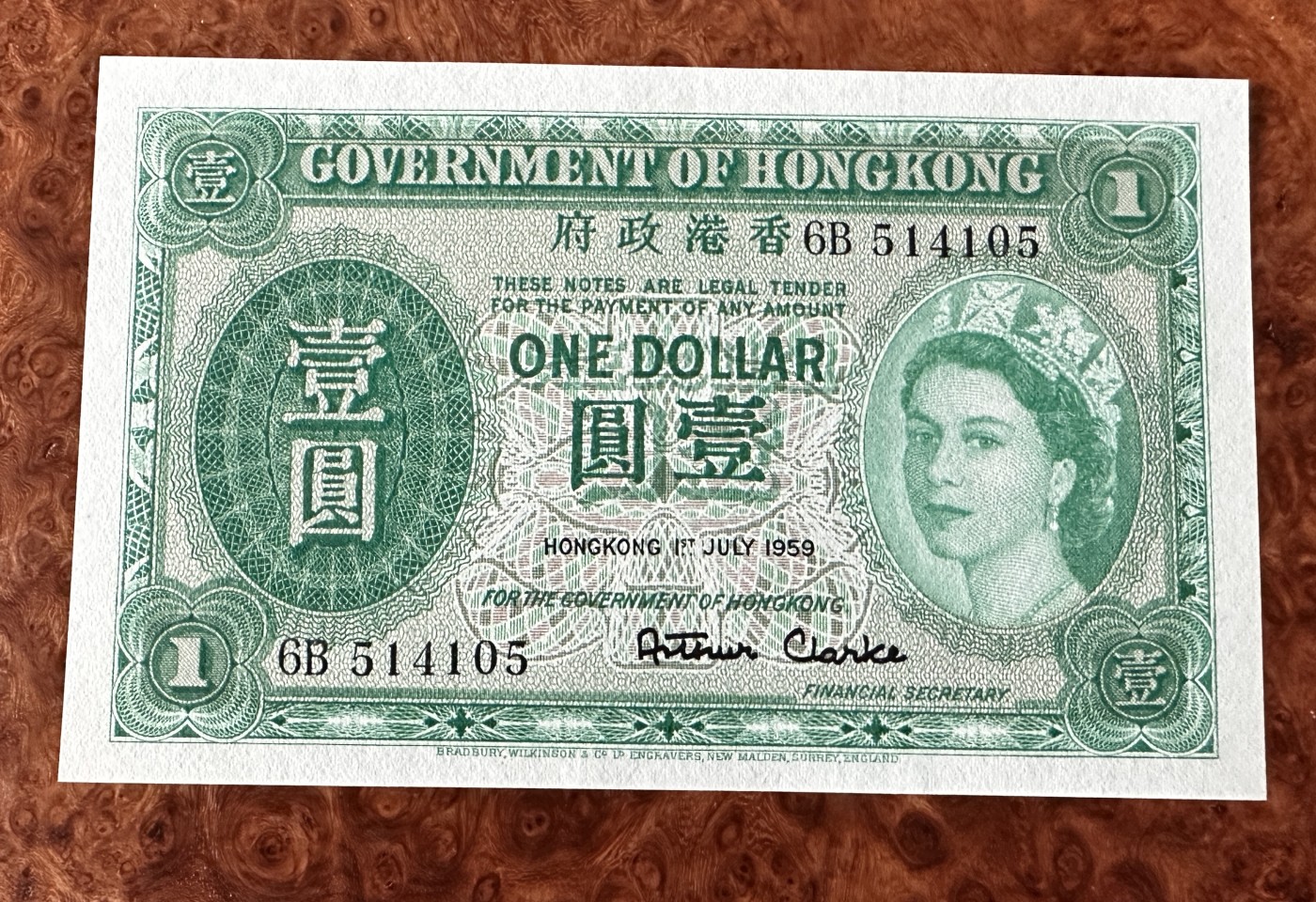 Chase Auction 第23期 - - 外钞、民国钞和人民币混合场！ 香港早期1元，大冠女王，UNC，品相如图！