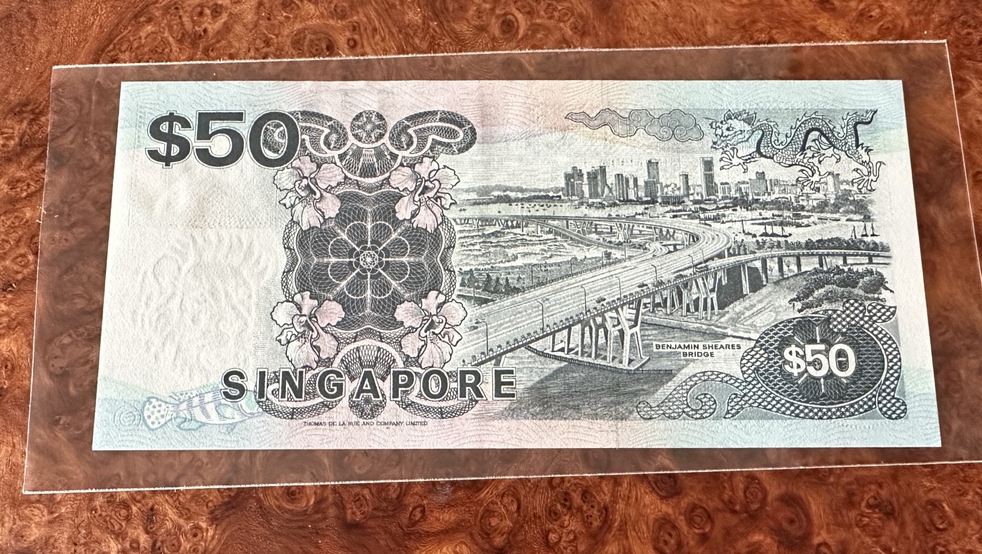 Chase Auction 第23期 - - 外钞、民国钞和人民币混合场！ 新加坡50元，船版，UNC-，品相如图！