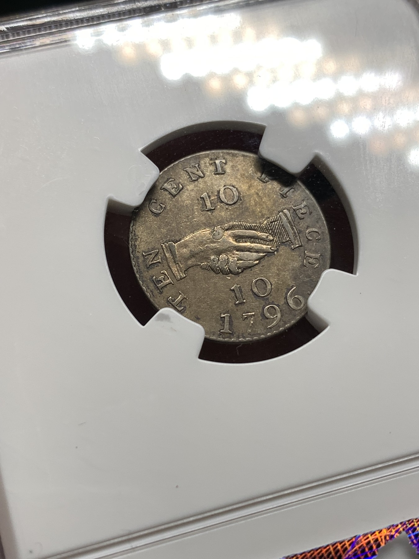 《竞宝斋》第187场-周日，周一 2场 (全场包邮) NGC AU58 1796年 塞拉利昂10美分银币 Soho铸币厂 发型量仅9227枚，高分极其稀少 盒边小磕