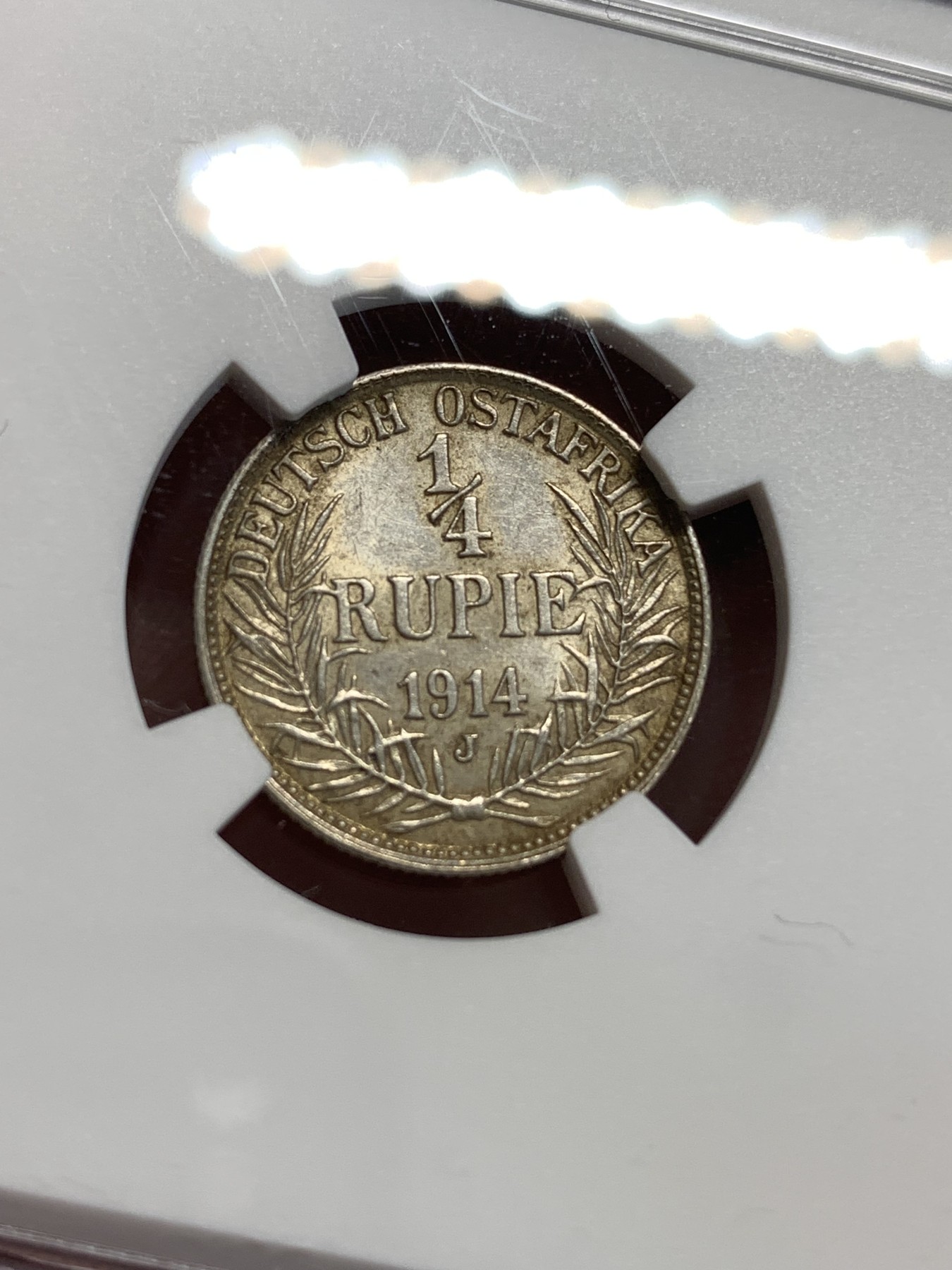 《竞宝斋》第187场-周日，周一 2场 (全场包邮) NGC UNC 东非1/4卢比银币 稀少面值 年份少见 给个正面清洗实在无语 可以再试试