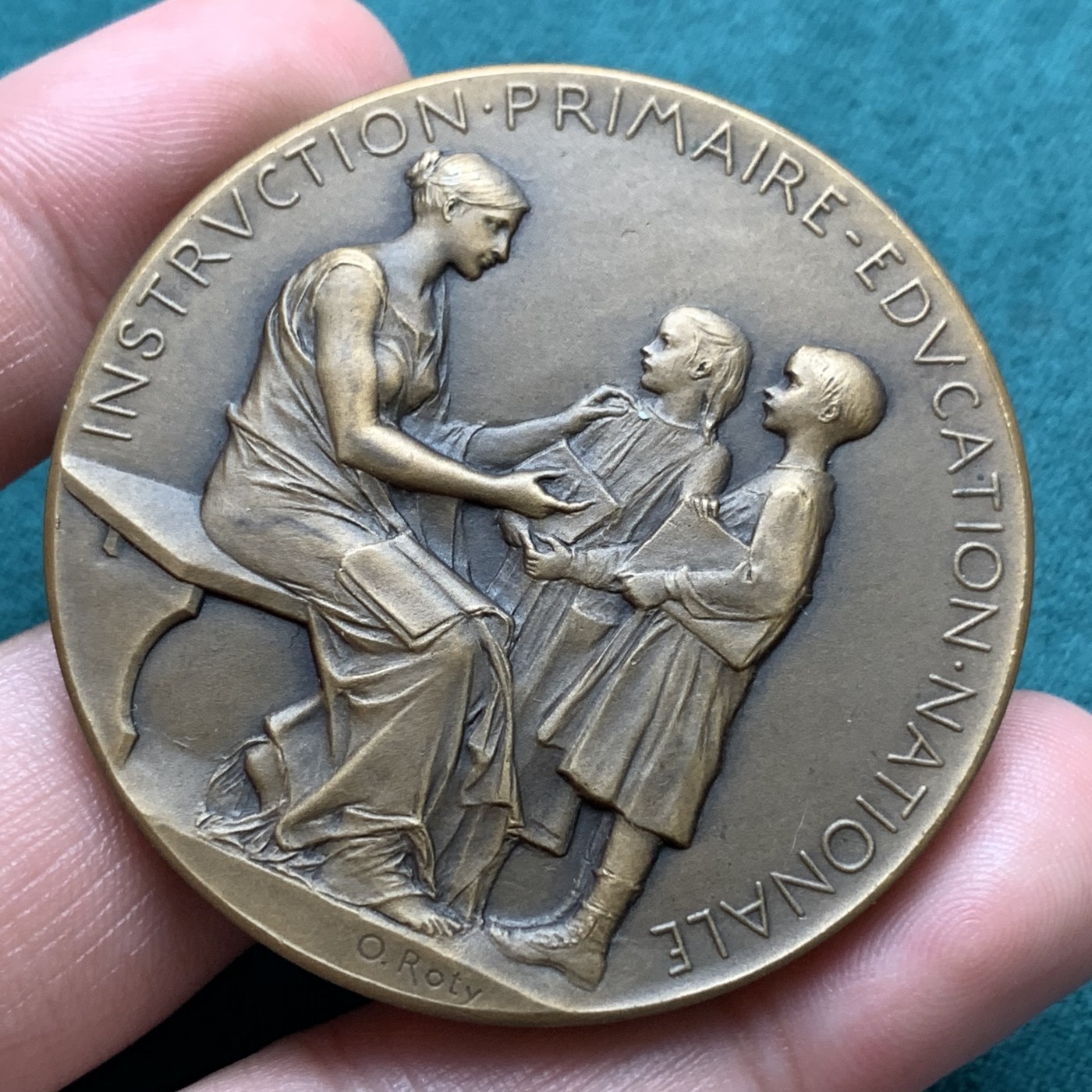 《竞宝斋》第187场-周日，周一 2场 (全场包邮) 法国罗蒂经典教育铜章   直径：50mm 重量：61.83g   边铭：丰饶角加铜标