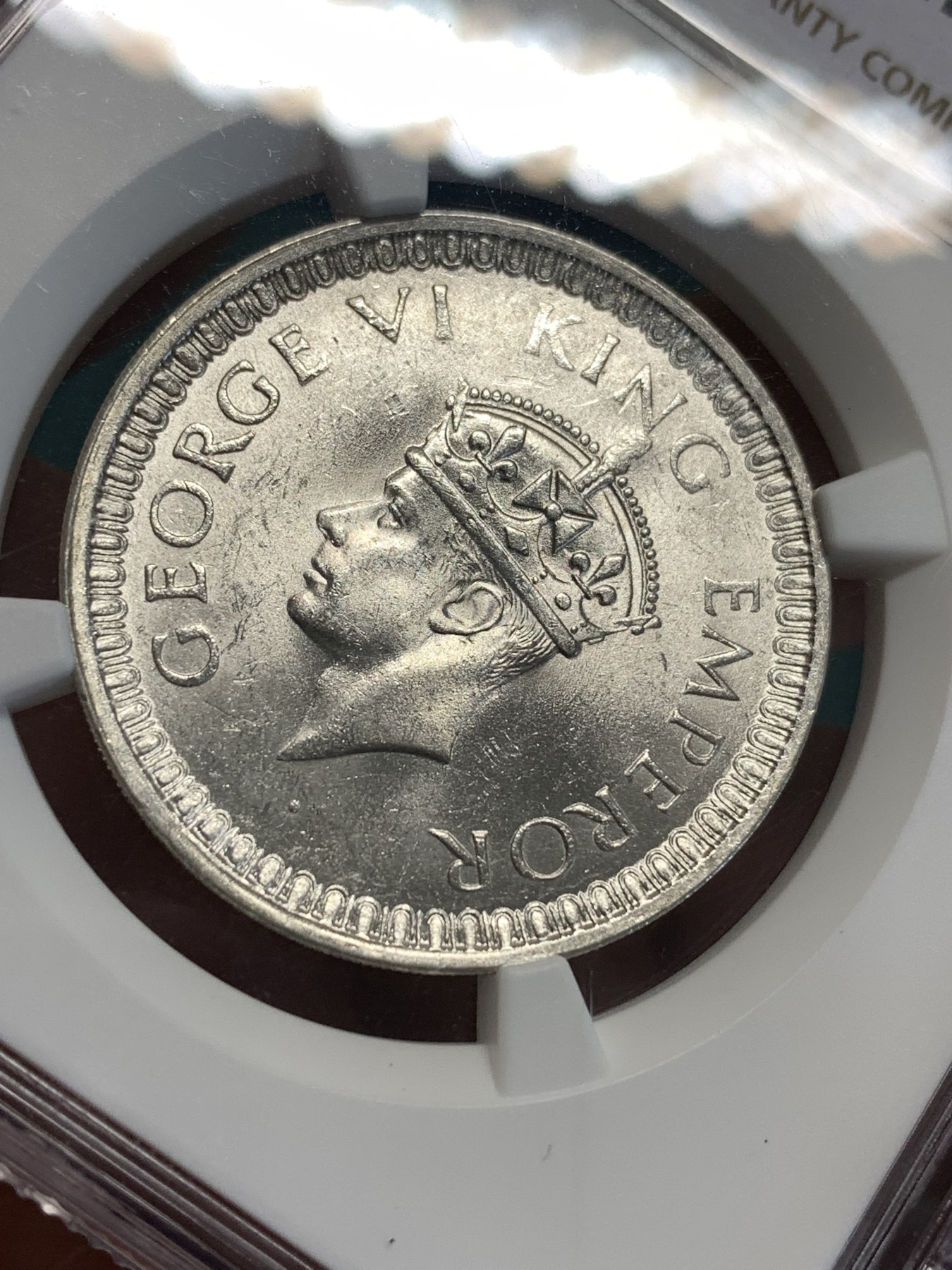 《竞宝斋》第187场-周日，周一 2场 (全场包邮) NGC-MS62 英属印度 少见1942年B版乔治六世一卢比银币，光度及佳 ，设计精美