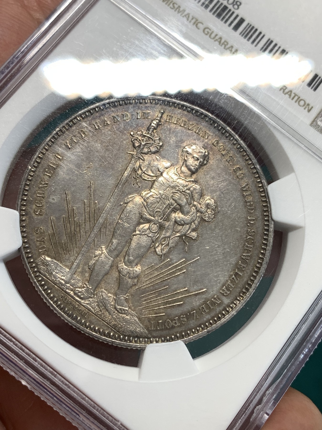 《竞宝斋》第187场-周日，周一 2场 (全场包邮) NGC-UNC 瑞士1879年 巴塞尔射击节5法郎银币   淡彩包浆 细节清晰