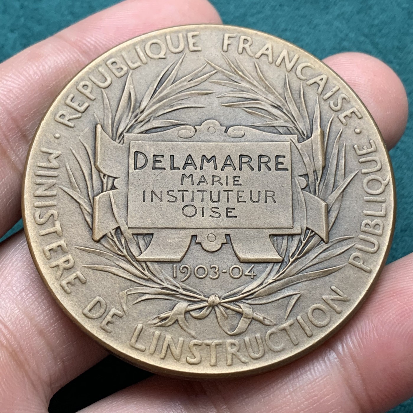 《竞宝斋》第187场-周日，周一 2场 (全场包邮) 法国罗蒂经典教育铜章   直径：50mm 重量：61.83g   边铭：丰饶角加铜标