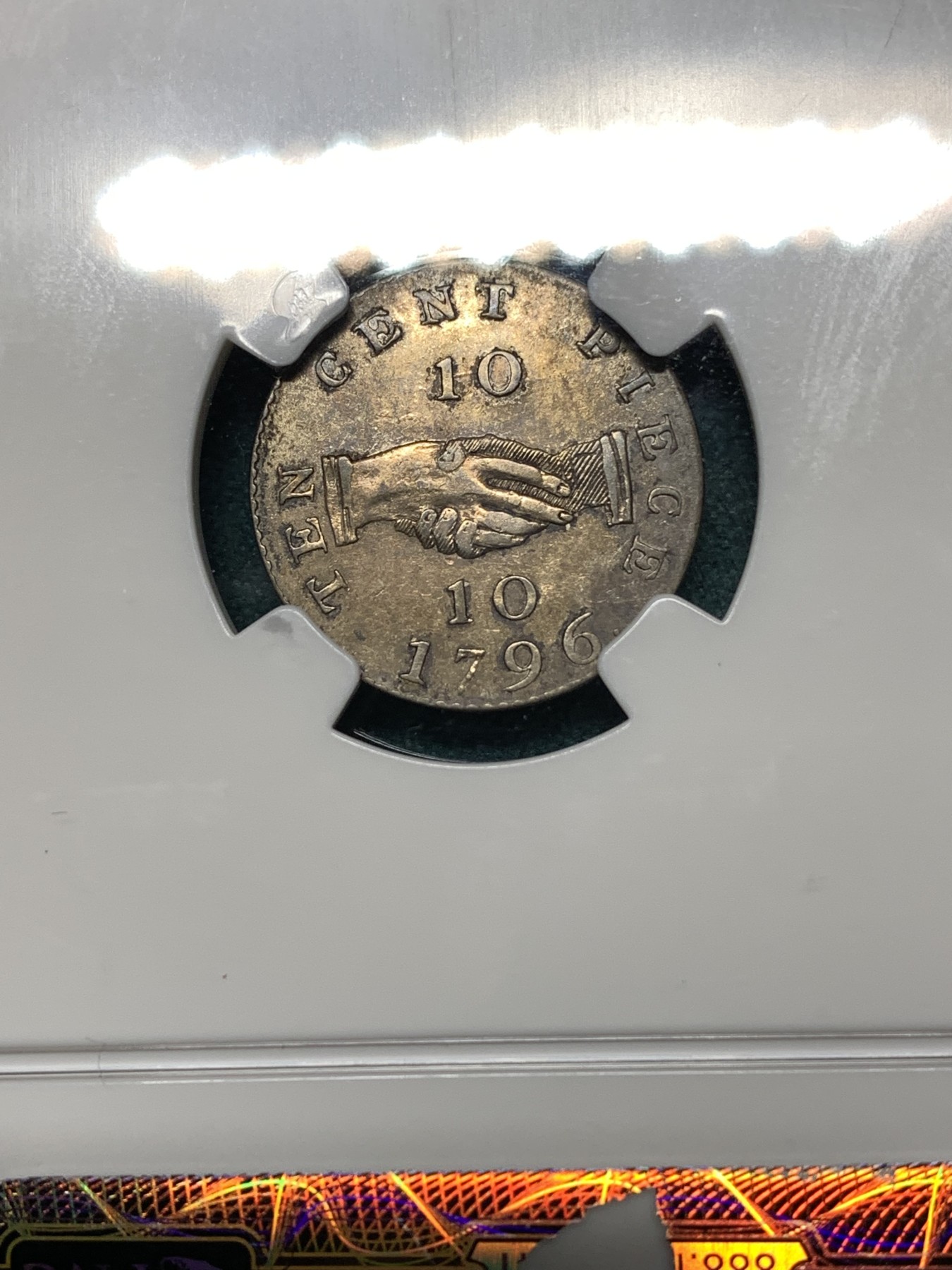 《竞宝斋》第187场-周日，周一 2场 (全场包邮) NGC AU58 1796年 塞拉利昂10美分银币 Soho铸币厂 发型量仅9227枚，高分极其稀少 盒边小磕