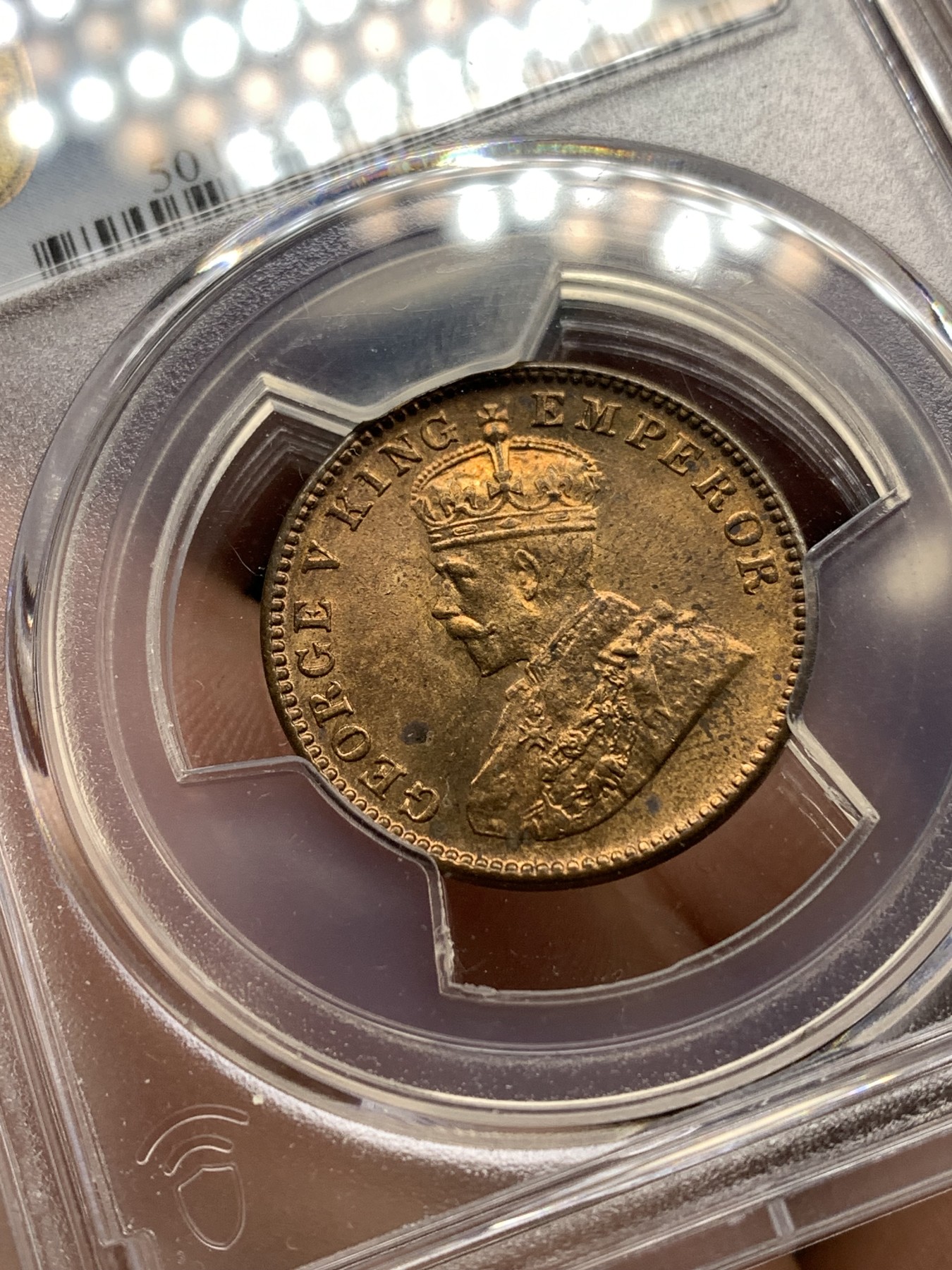 《竞宝斋》第187场-周日，周一 2场 (全场包邮) PCGS-MS63RB 英属印度1929C乔治五世1/4安娜铜币，背面可见透打。铜光带彩，光泽靓丽，状态上佳。