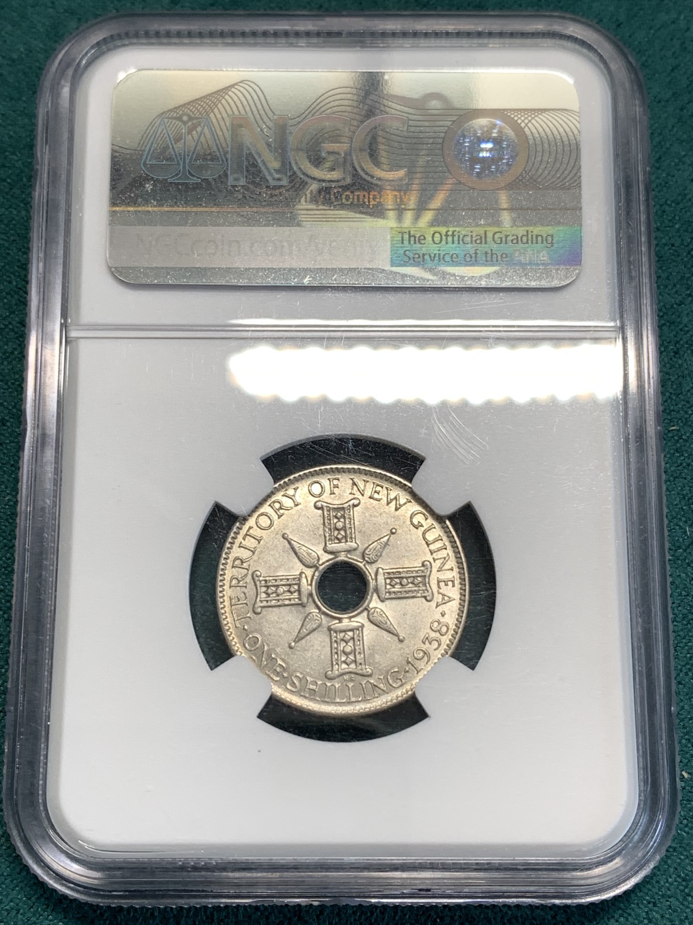 《竞宝斋》第187场-周日，周一 2场 (全场包邮) NGC-MS62  新几内亚 1938年 乔治六世一先令银币，转光良好，设计精美，融合英伦皇家气派与新几内亚土著风情