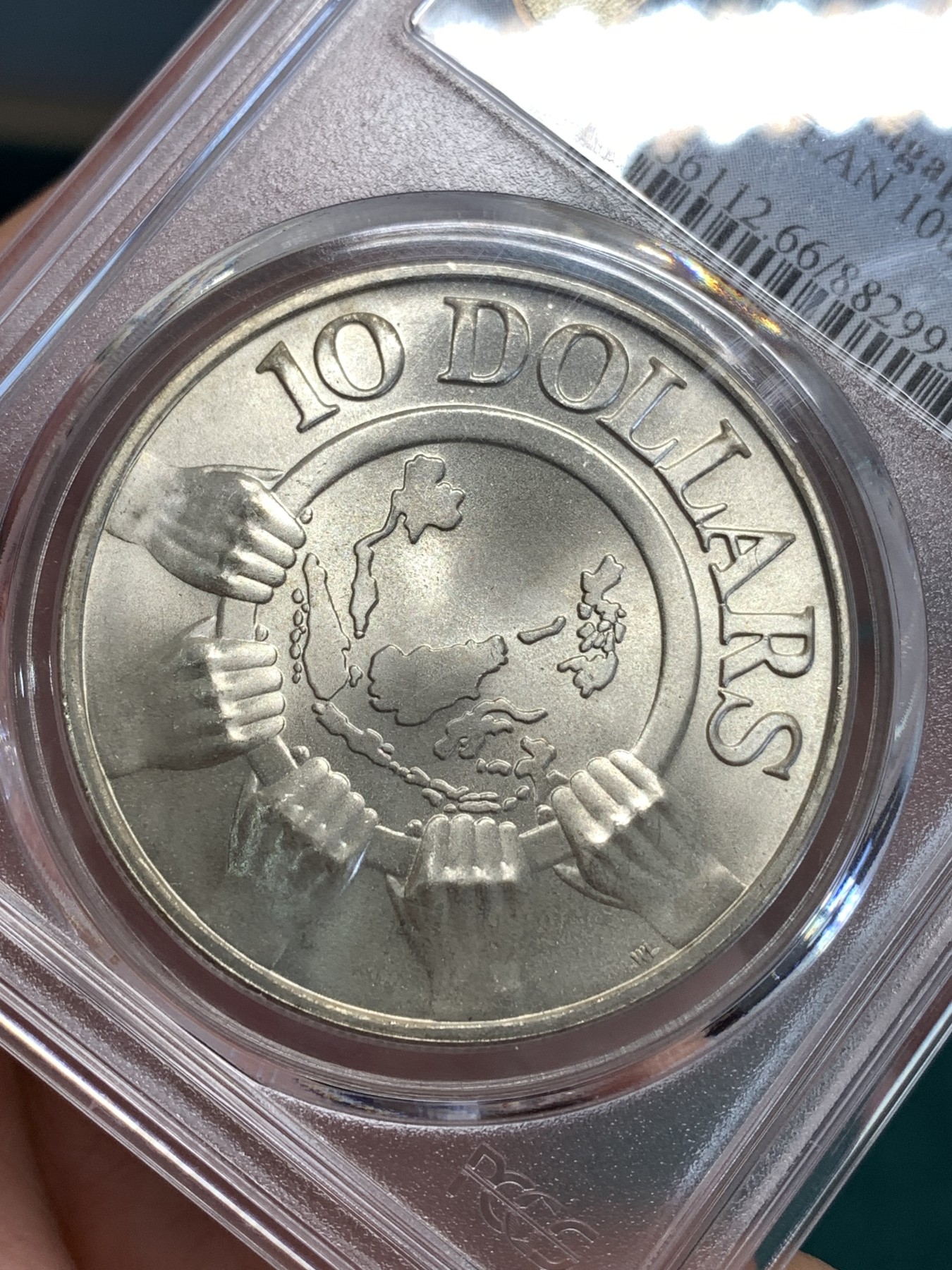 《竞宝斋》第187场-周日，周一 2场 (全场包邮) PCGS MS66 新加坡1977年东盟10周年10元大银币 旋转光