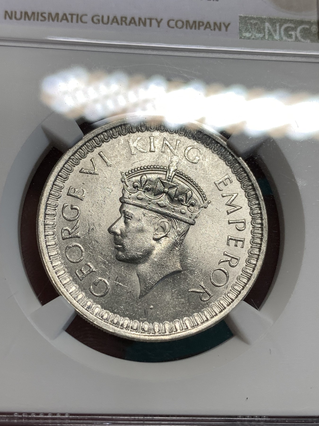 《竞宝斋》第187场-周日，周一 2场 (全场包邮) NGC-MS62 英属印度 少见1942年B版乔治六世一卢比银币，光度及佳 ，设计精美