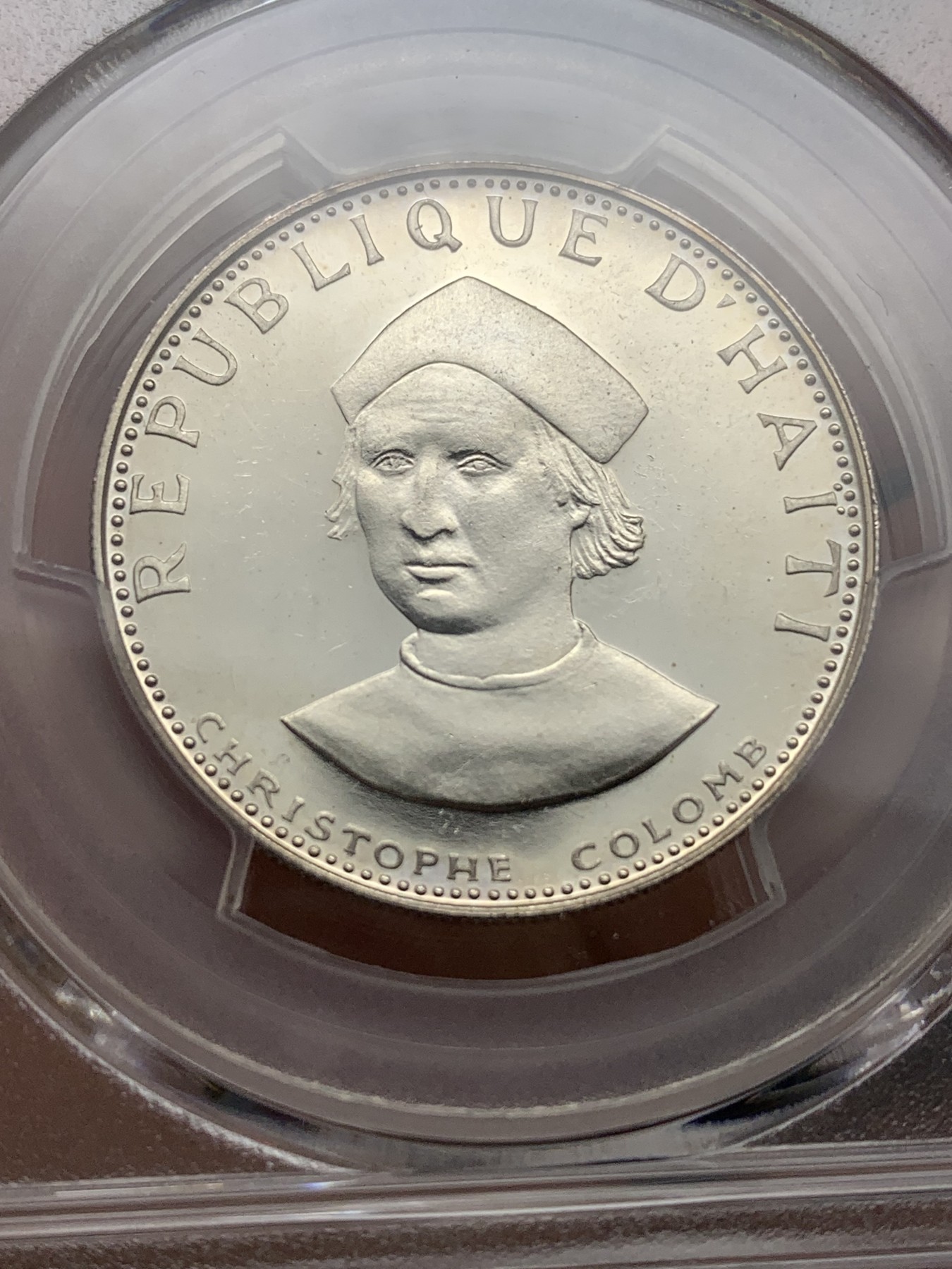 《竞宝斋》第187场-周日，周一 2场 (全场包邮) PCGS-PR63DCAM 海地 1973年 哥伦布 25G 精致银币