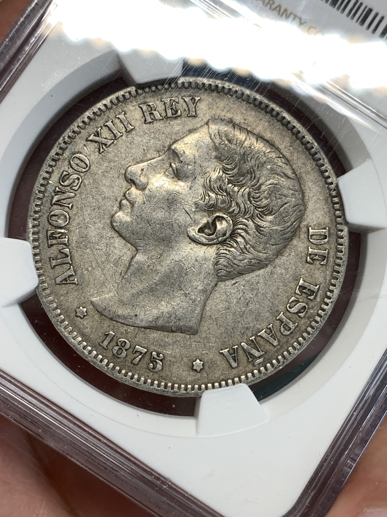 《竞宝斋》第187场-周日，周一 2场 (全场包邮) NGC XF45 西班牙1875年双柱阿方索十二世银币 细节好