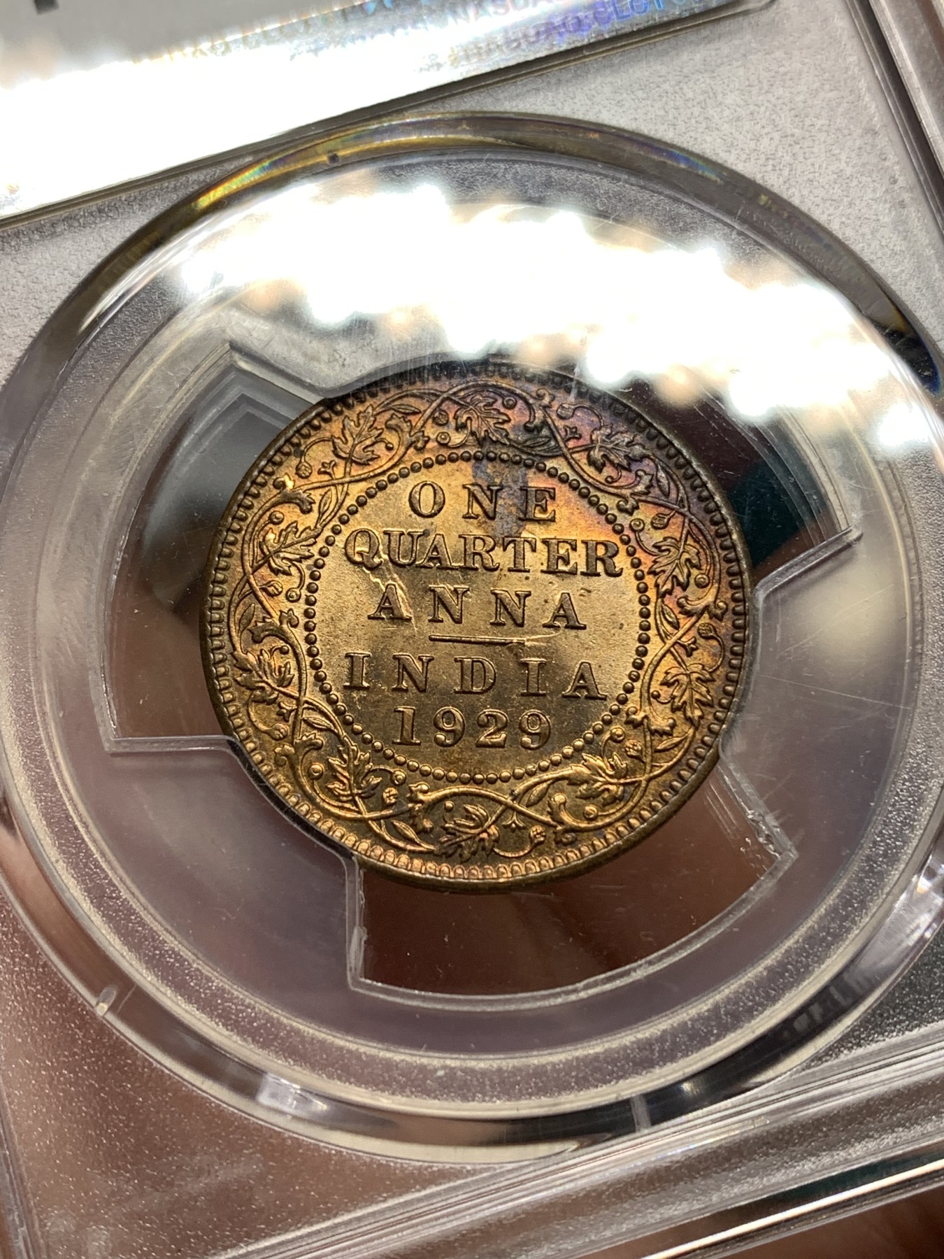 《竞宝斋》第187场-周日，周一 2场 (全场包邮) PCGS-MS63RB 英属印度1929C乔治五世1/4安娜铜币，背面可见透打。铜光带彩，光泽靓丽，状态上佳。