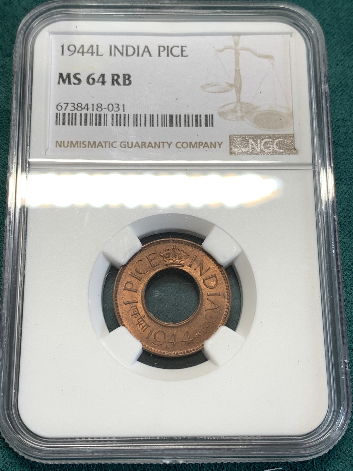 《竞宝斋》第188场-周日，周一 2场 (全场包邮) NGC MS64 英属印度 1944年L版 乔治六世 1派沙中孔铜币 高冠 少见厂别 高分不易