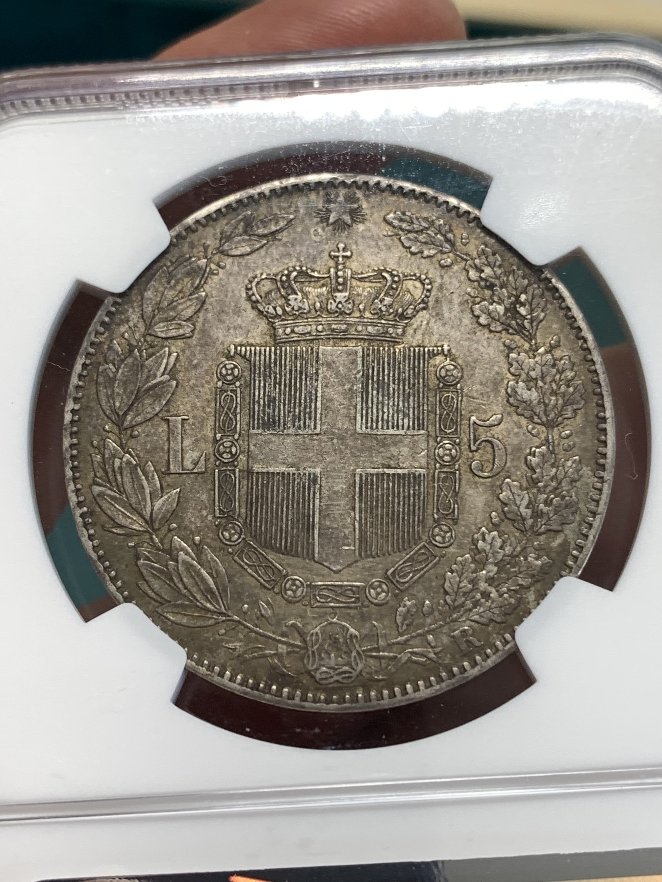 《竞宝斋》第188场-周日，周一 2场 (全场包邮) NGC AU58 意大利1879年翁贝托一世5里拉银币，极美包浆。细节精细，两只眼睛炯炯有神