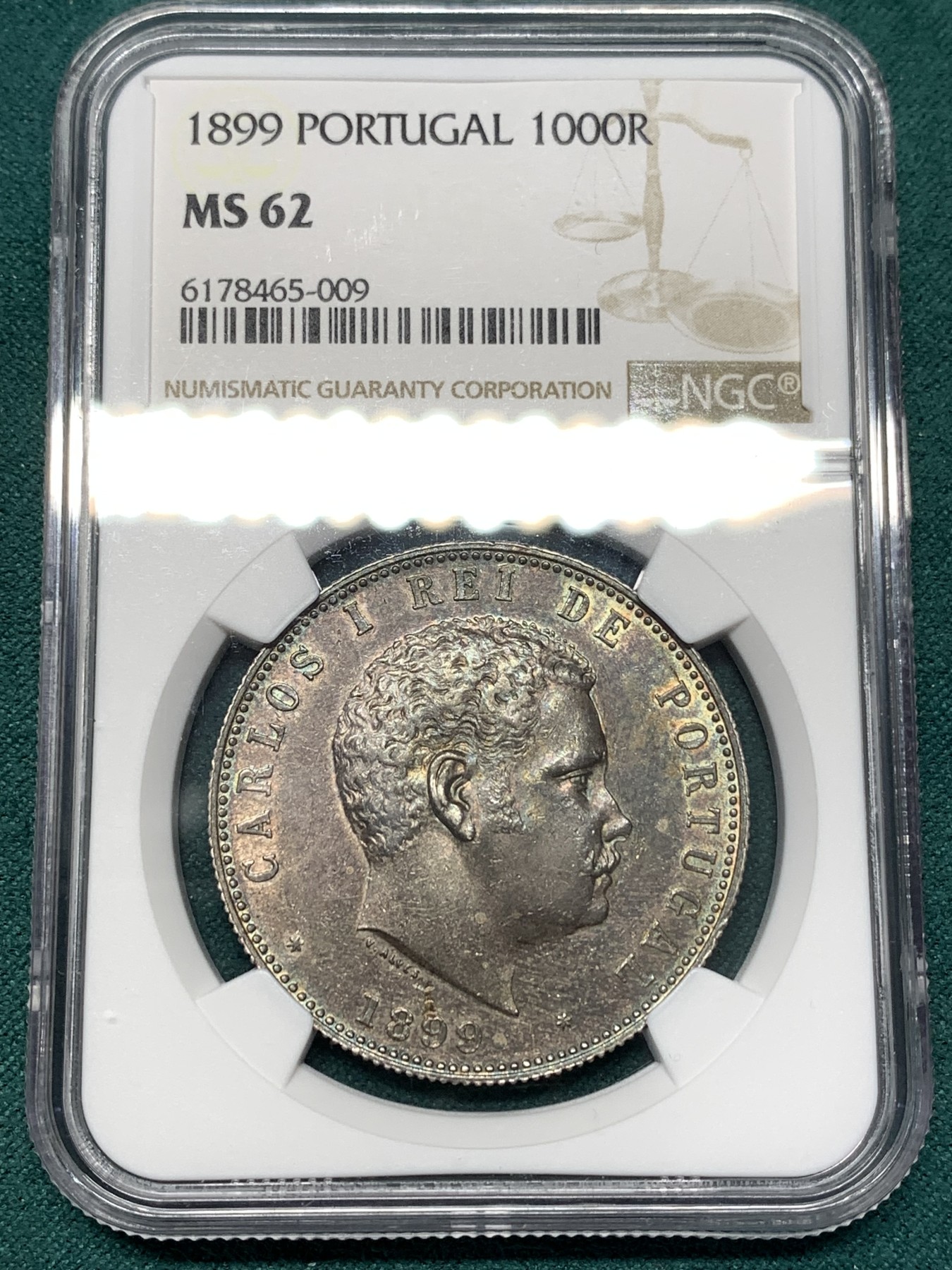 《竞宝斋》第188场-周日，周一 2场 (全场包邮) NGC MS62 葡萄牙1899年卡洛斯一世头像1000瑞斯银币，国币流行黑浆彩，一流老味道。状态极其出色