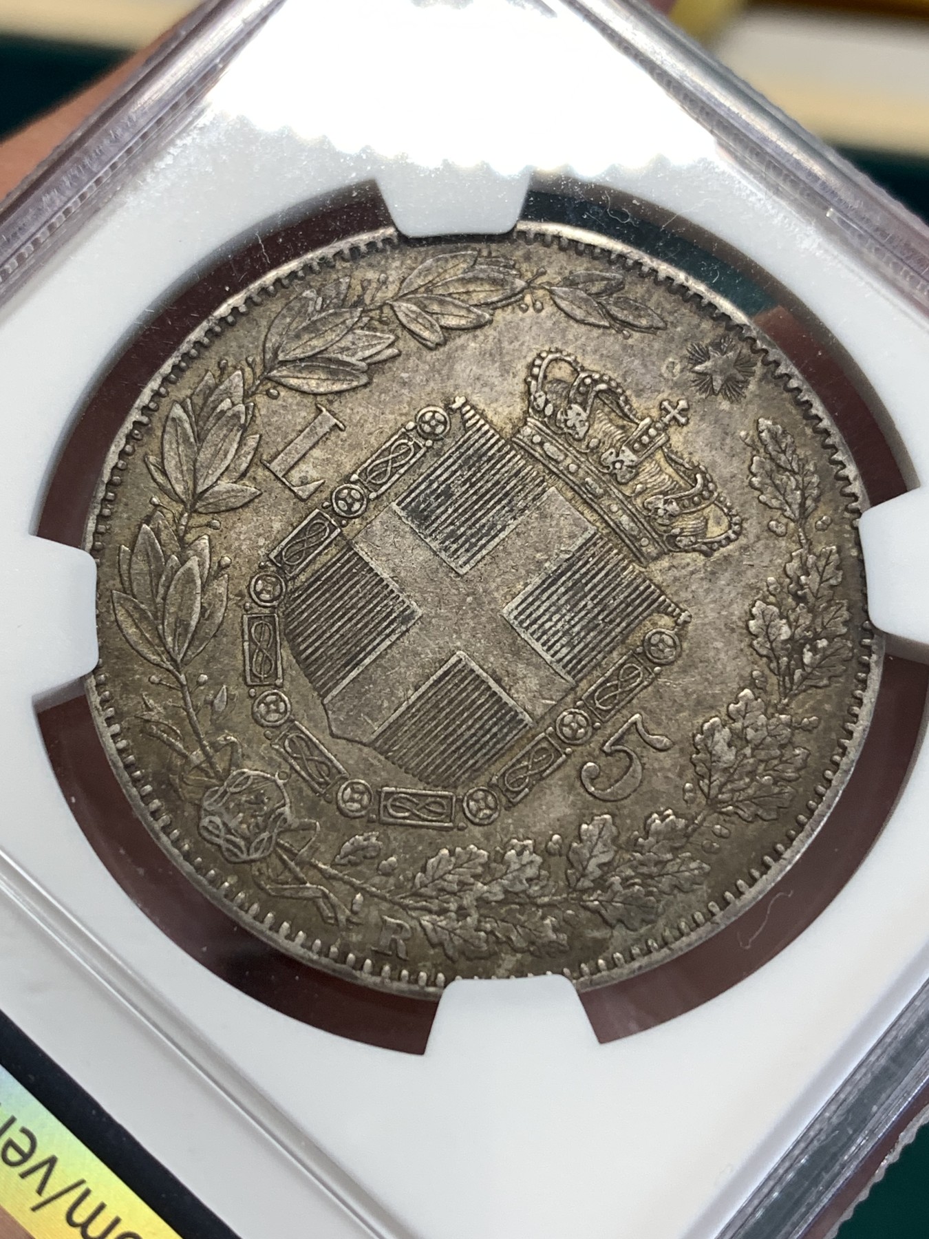 《竞宝斋》第188场-周日，周一 2场 (全场包邮) NGC AU58 意大利1879年翁贝托一世5里拉银币，极美包浆。细节精细，两只眼睛炯炯有神