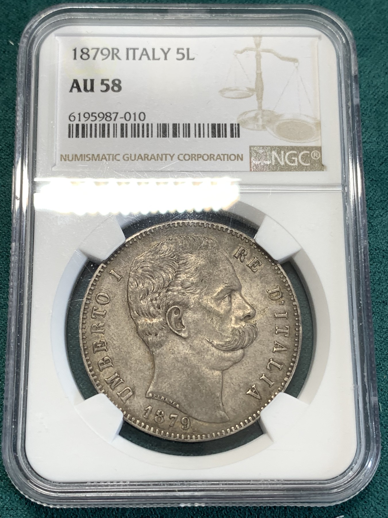 《竞宝斋》第188场-周日，周一 2场 (全场包邮) NGC AU58 意大利1879年翁贝托一世5里拉银币，极美包浆。细节精细，两只眼睛炯炯有神
