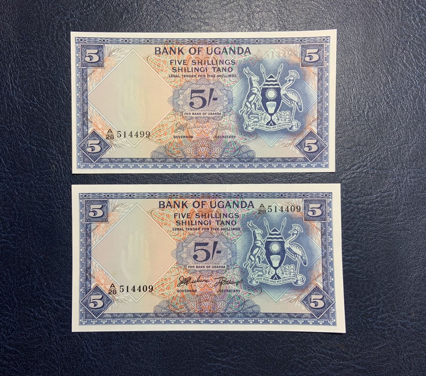 收藏联盟Quantum Auction 第280期拍卖  乌干达1966年5先令2张 品相UNC 该国首枚纸币 PICK1a 裁切原因两张大小相差1mm并且其中一张水印处有一个杂质黄点，另一张边缘微瑕