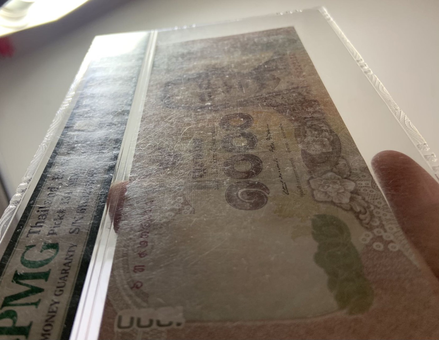 收藏联盟Quantum Auction 第280期拍卖  泰国2017年1000泰铢纪念钞 PMG65 888豹子号 号码无47 壳子有磨擦