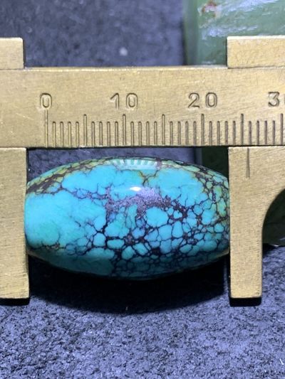 精美十堰高瓷蓝网花松石桶珠一颗 精美十堰高瓷蓝网花松石桶珠一颗