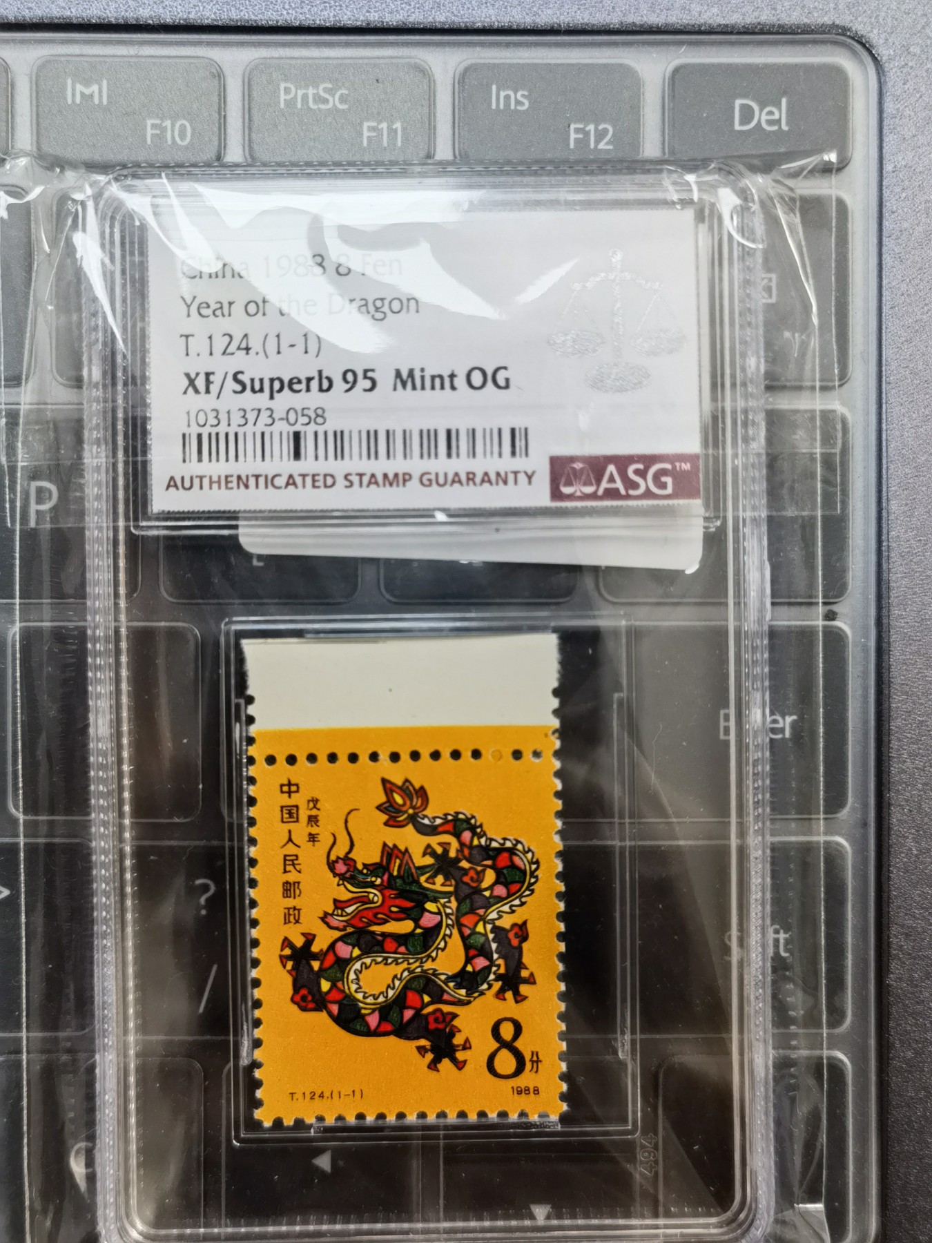 和夏天说再见。 首轮生肖龙年纪念币有钱。ASG95