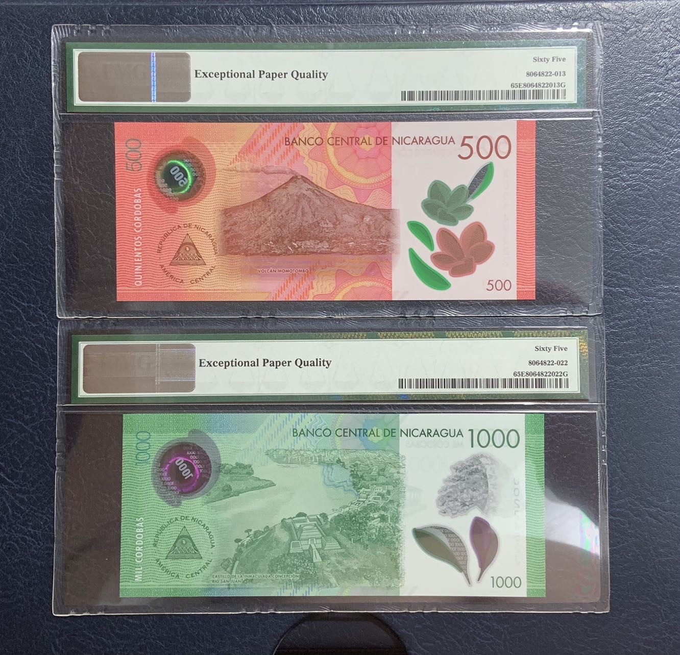 收藏联盟Quantum Auction 第281期拍卖  尼加拉瓜2017年500和1000科多巴尾二同首发A冠 PMG65 默默汤博火山