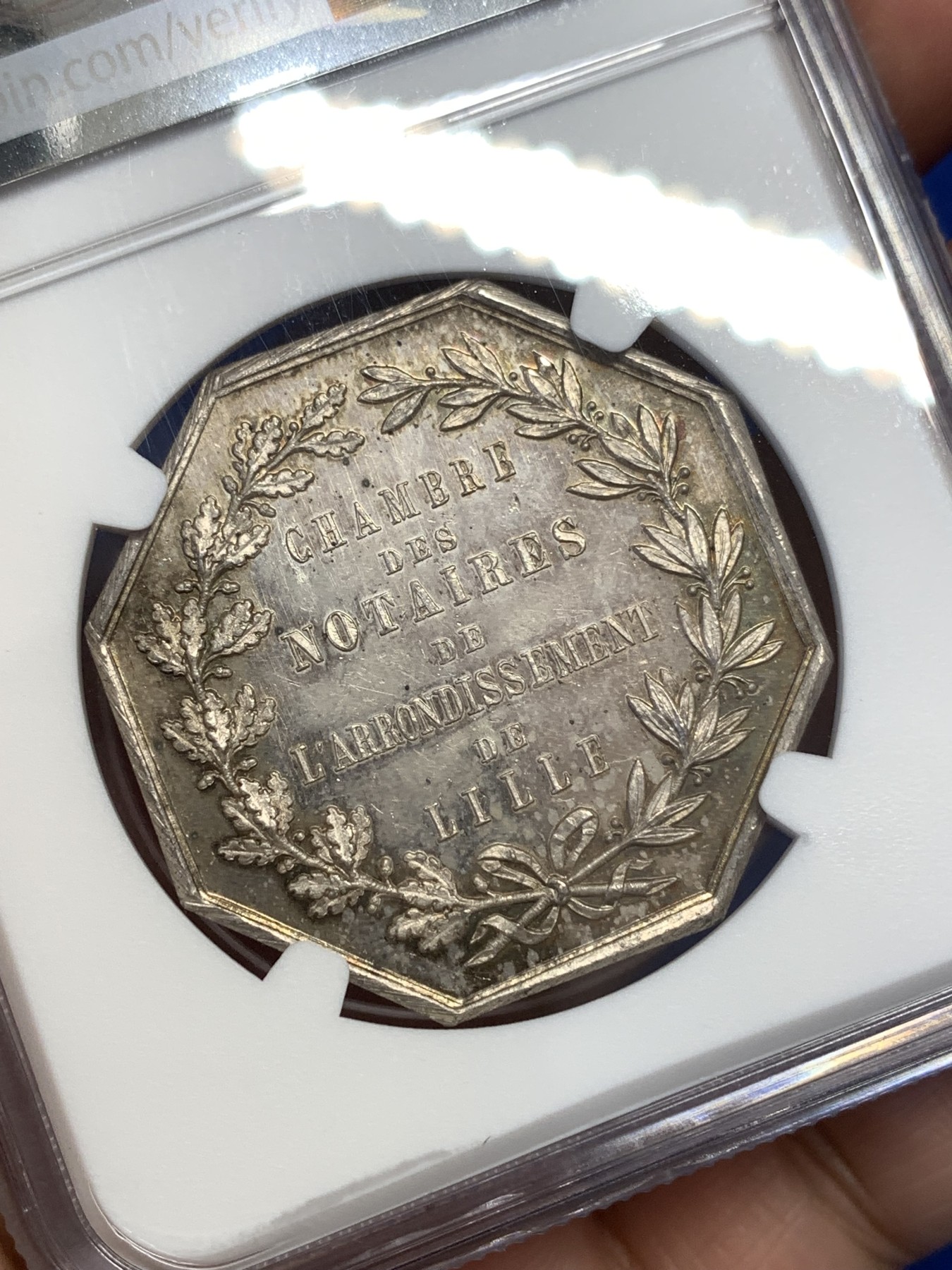 《竞宝斋》第189场-周日，周一 2场 (全场包邮) NGC-MS63 法国1883年里尔公证处八角银质代币、五彩银质大规格八角、高浮雕63分不容易、手拿天秤公证处代币