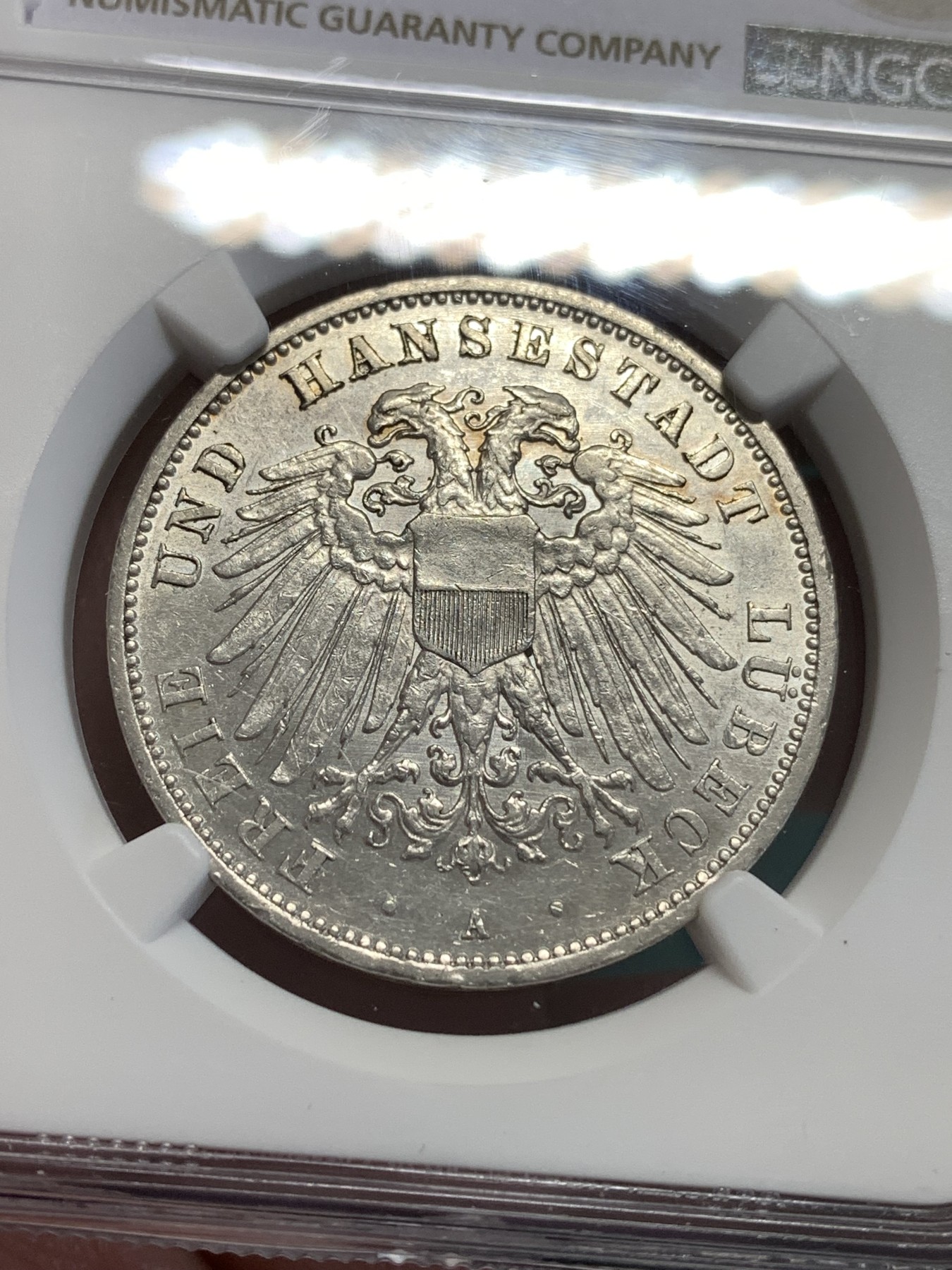 《竞宝斋》第189场-周日，周一 2场 (全场包邮) NGC MS62 德国1912吕贝克自由市双头鹰3马克银币