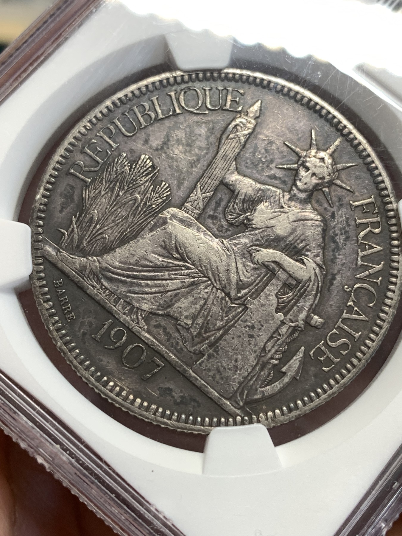 《竞宝斋》第189场-周日，周一 2场 (全场包邮) NGC XF45 法属印支1907坐洋一元银币