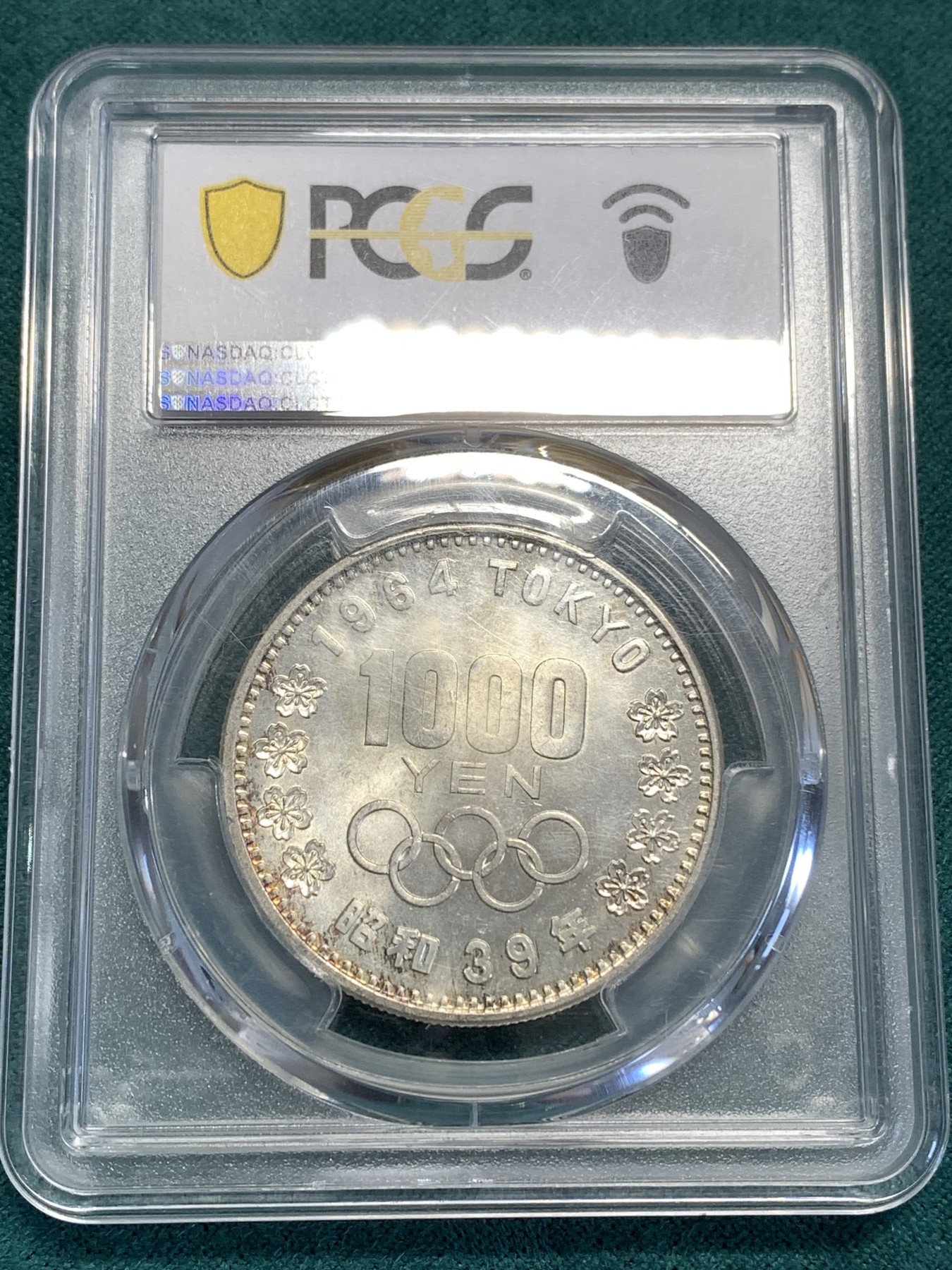 《竞宝斋》第189场-周日，周一 2场 (全场包邮) PCGS MS65  日本大奥1000元银币 干干净净  边缘有淡彩